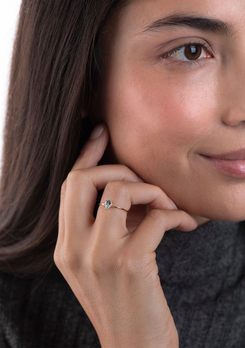 Gold over Sterling Silver Blue Topaz and White Topaz Pear Ring