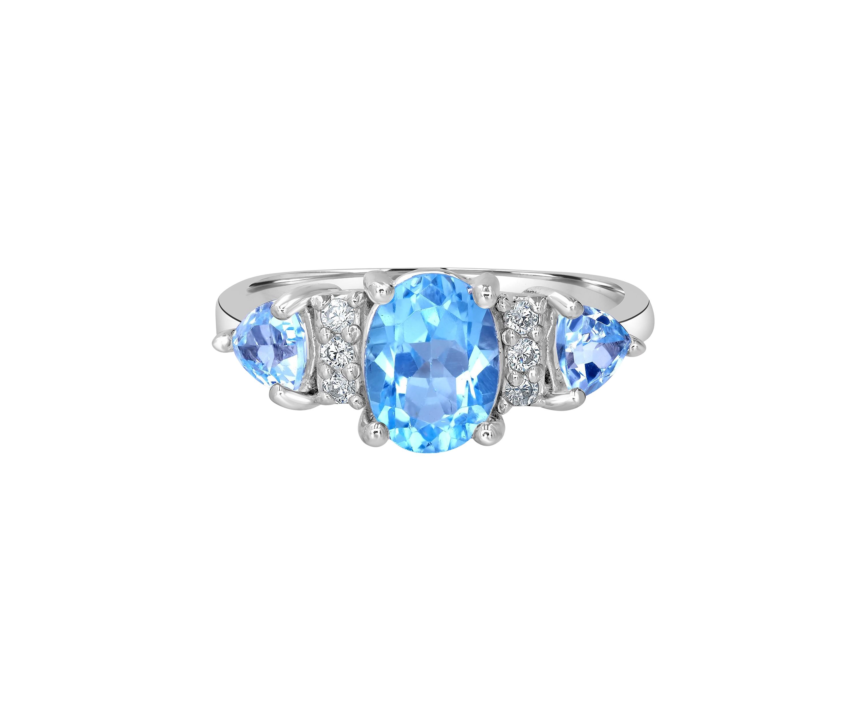 Sterling Silver Blue Topaz and White Topaz 3 Stone Ring