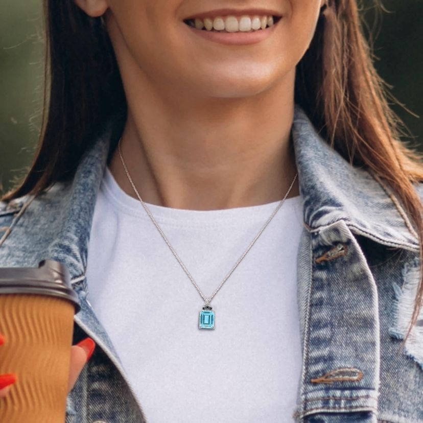 Sky Blue Topaz and Black Sapphire Pendant with Chain in Sterling Silver