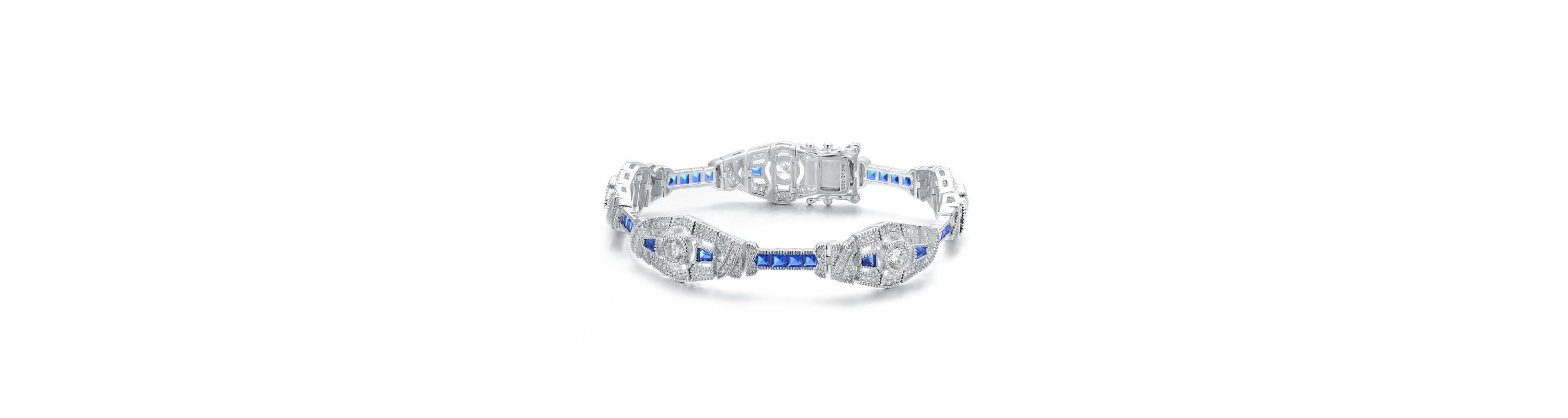 Lab Created Sterling Silver White Gold Plated Clear and Blue Cubic Zirconia Oval Link Bracelet