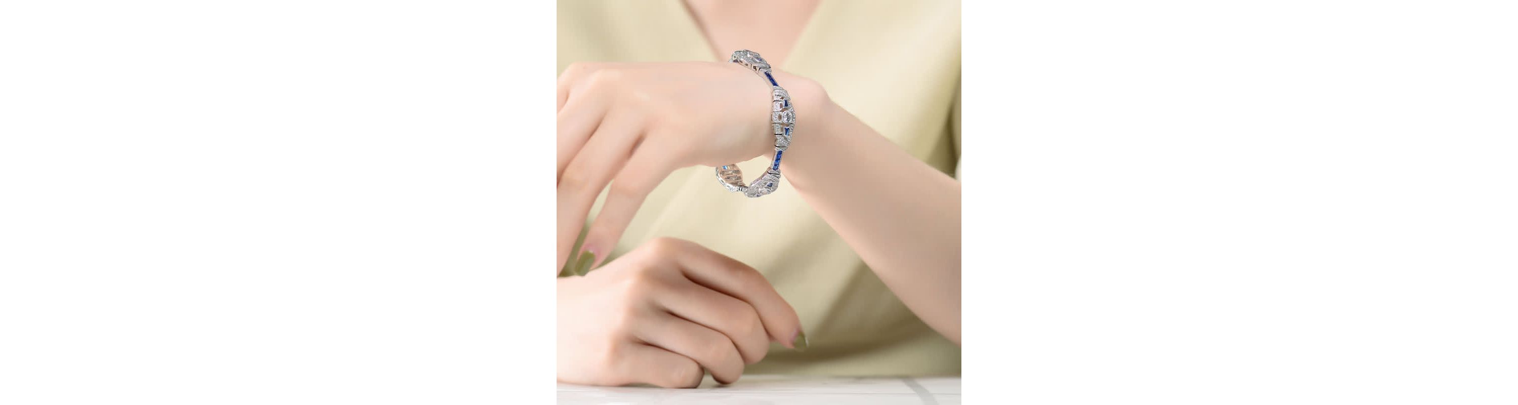 Lab Created Sterling Silver White Gold Plated Clear and Blue Cubic Zirconia Oval Link Bracelet