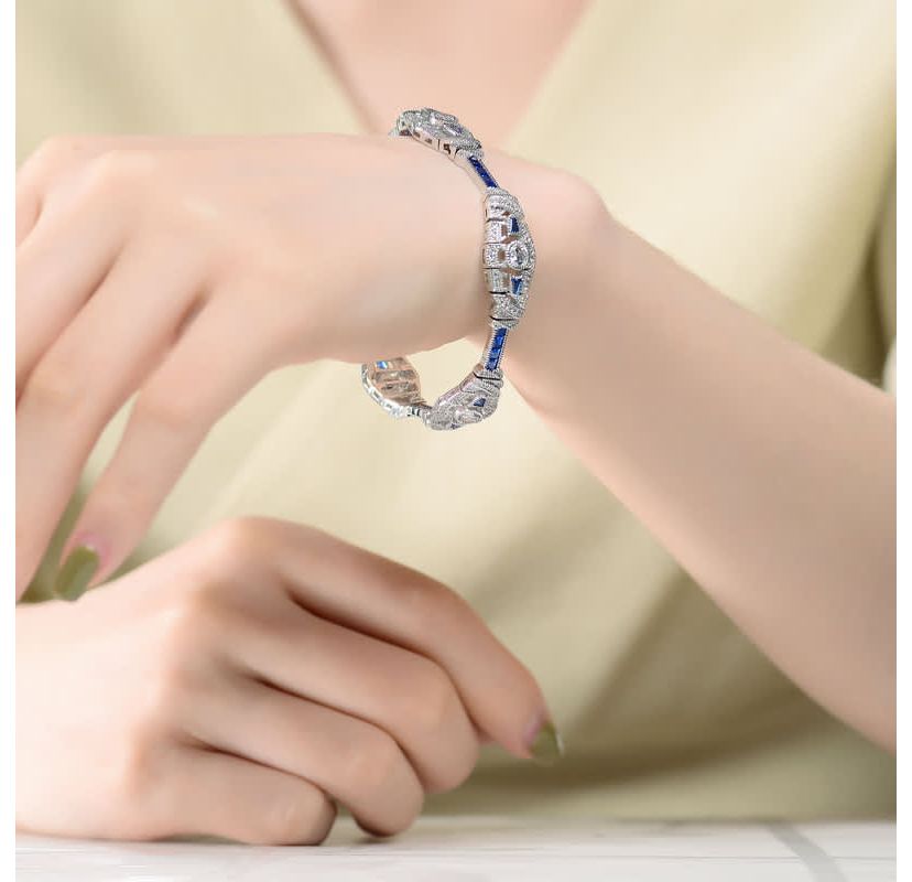 Lab Created Sterling Silver White Gold Plated Clear and Blue Cubic Zirconia Oval Link Bracelet