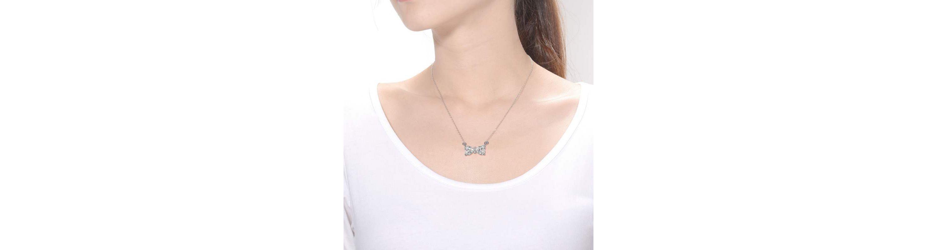 Sterling Silver White Gold Plated with 1.50ctw Lab Created Moissanite Bow-Tie Pendant Necklace