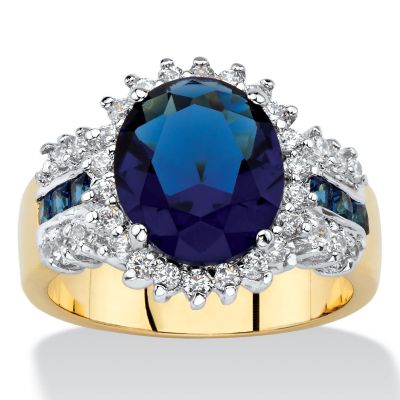 Seta Jewelry Oval-Cut Simulated Blue Sapphire and White Cubic Zirconia Halo Cocktail Ring 7.64 TCW Yellow Gold-Plated