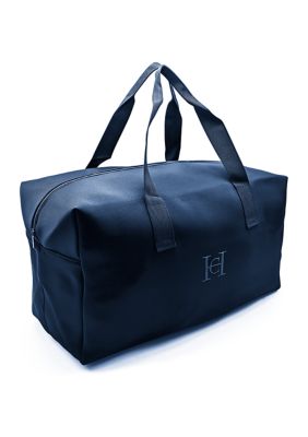  Free Bag with 3.4oz Carolina Herrera Men’s Fragrance Purchase 