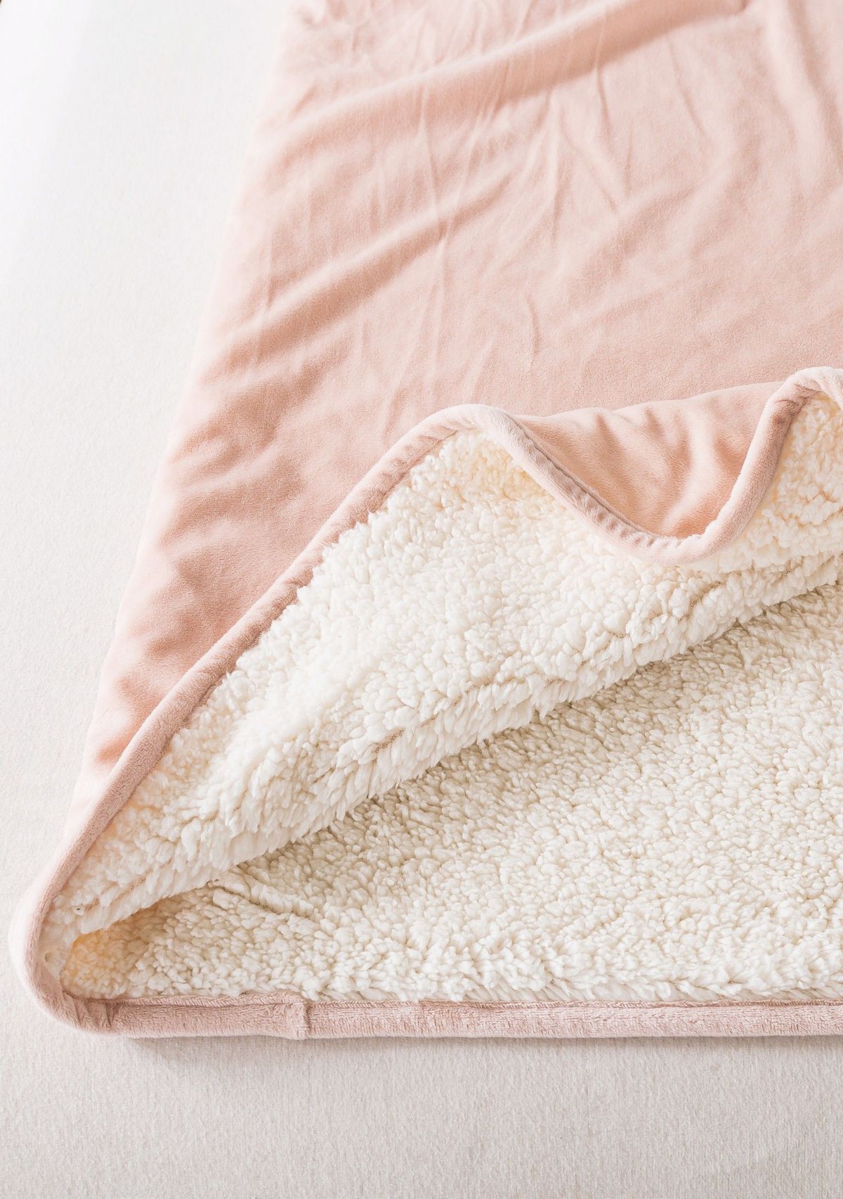 The Work Sack Velvet and Sherpa Wearable Throw