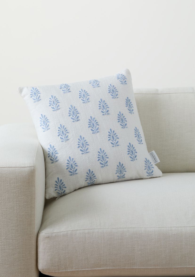 Embroidered White and Blue Pillow