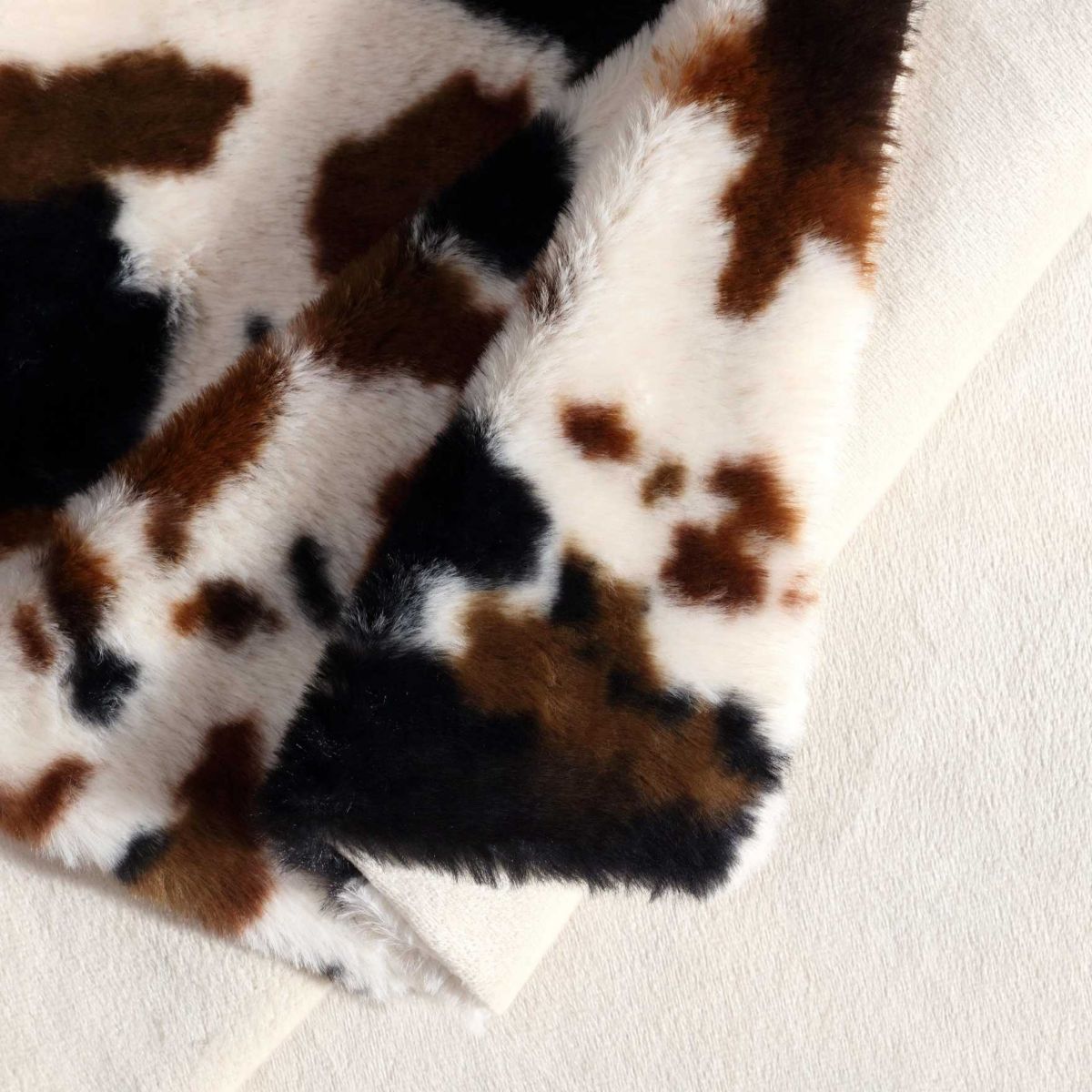 Spotted Cow Print Microfiber Throw