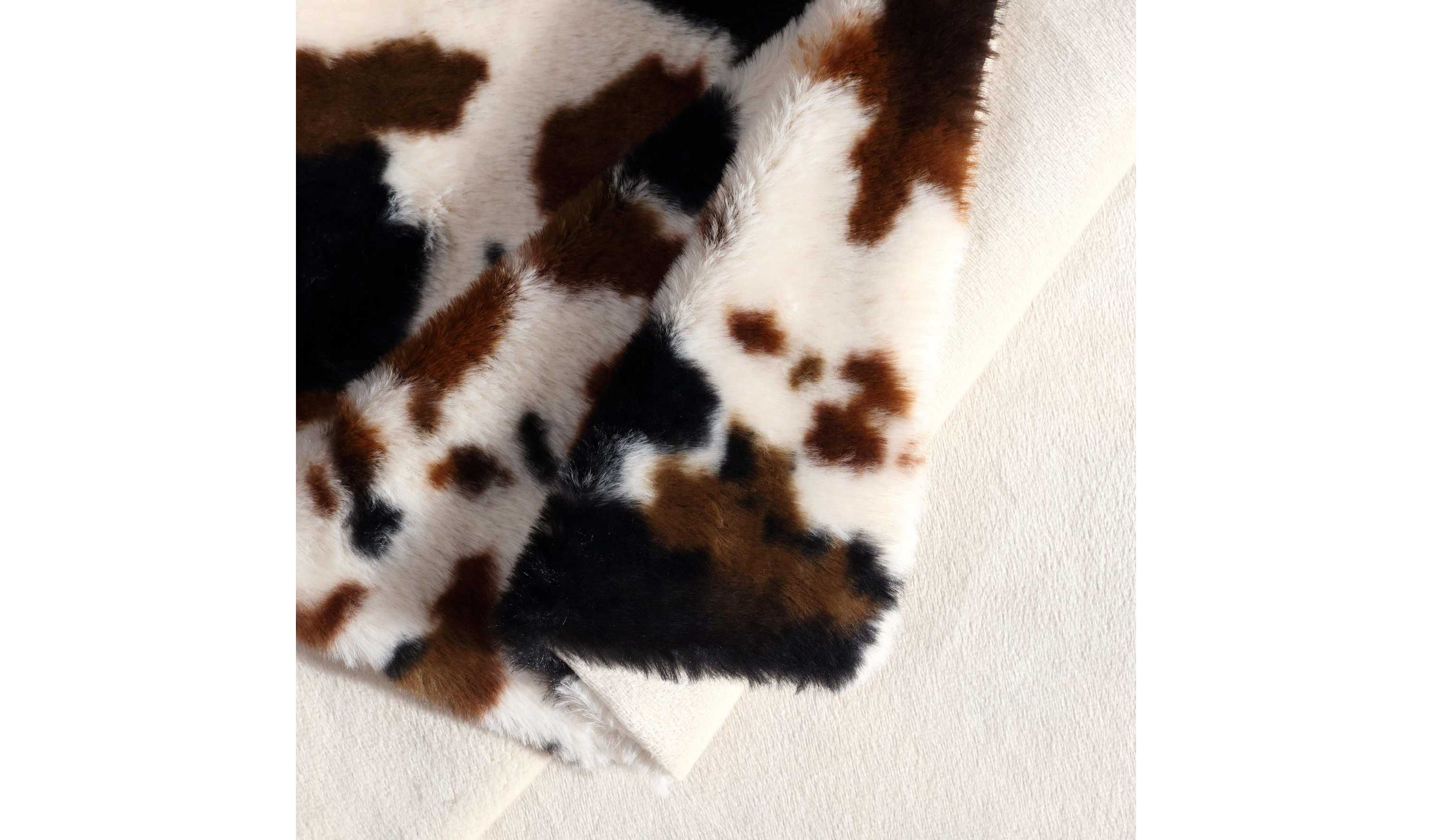 Spotted Cow Print Microfiber Throw