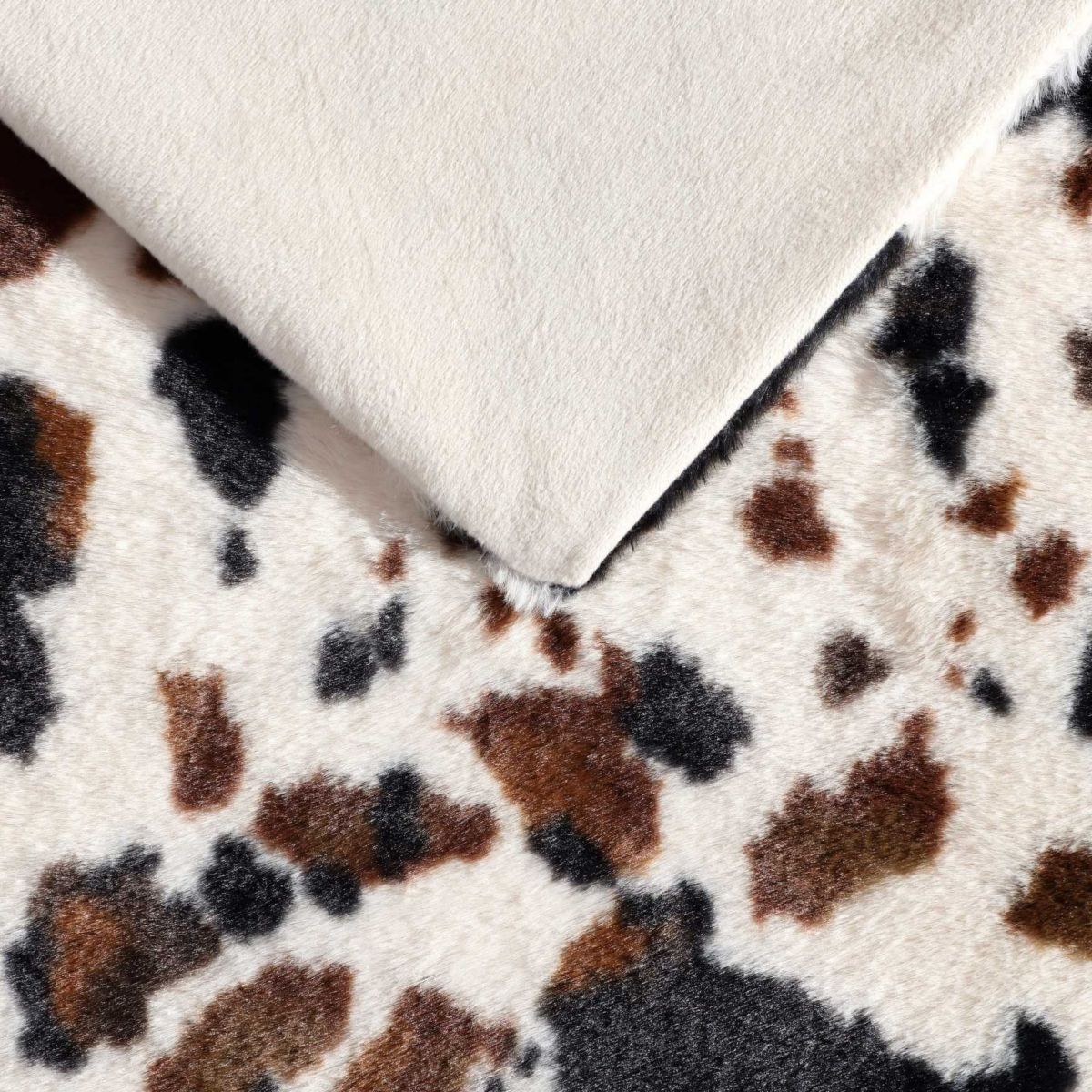 Spotted Cow Print Microfiber Throw