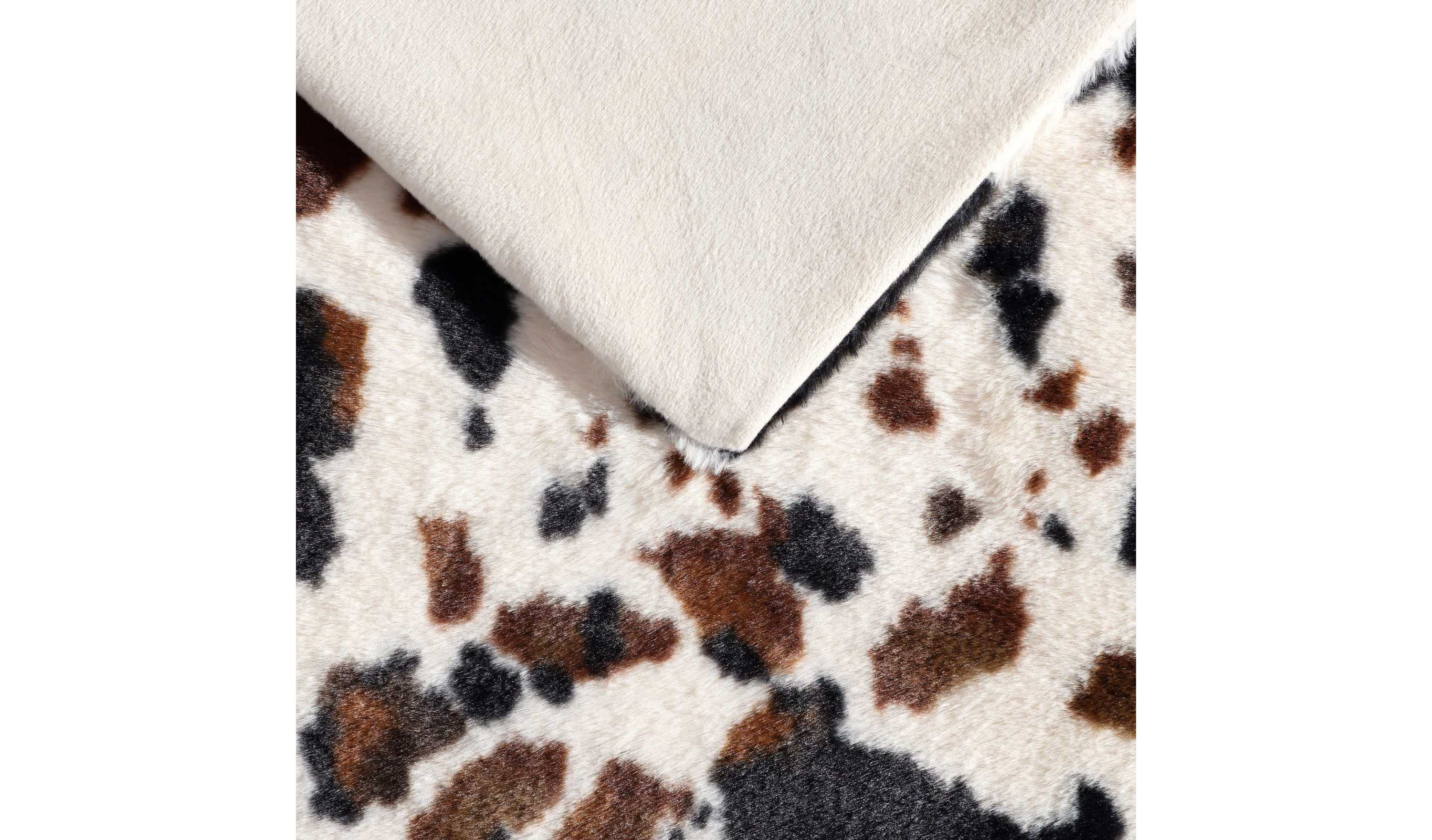 Spotted Cow Print Microfiber Throw