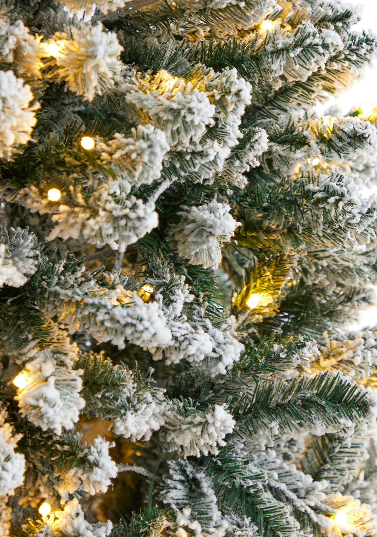 6 Slim Flocked Montreal Fir Artificial Christmas Tree with 250 Warm White LED Lights and 743 Bendable Branches