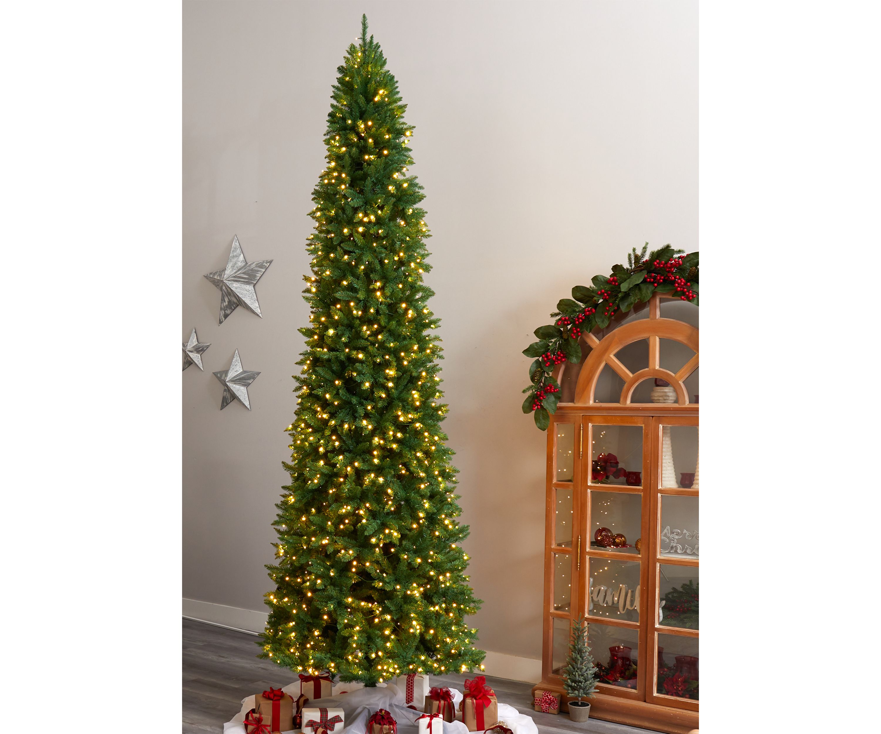 12 Foot Slim Green Mountain Pine Artificial Christmas Tree with 1100 Clear LED Lights and 3235 Tips