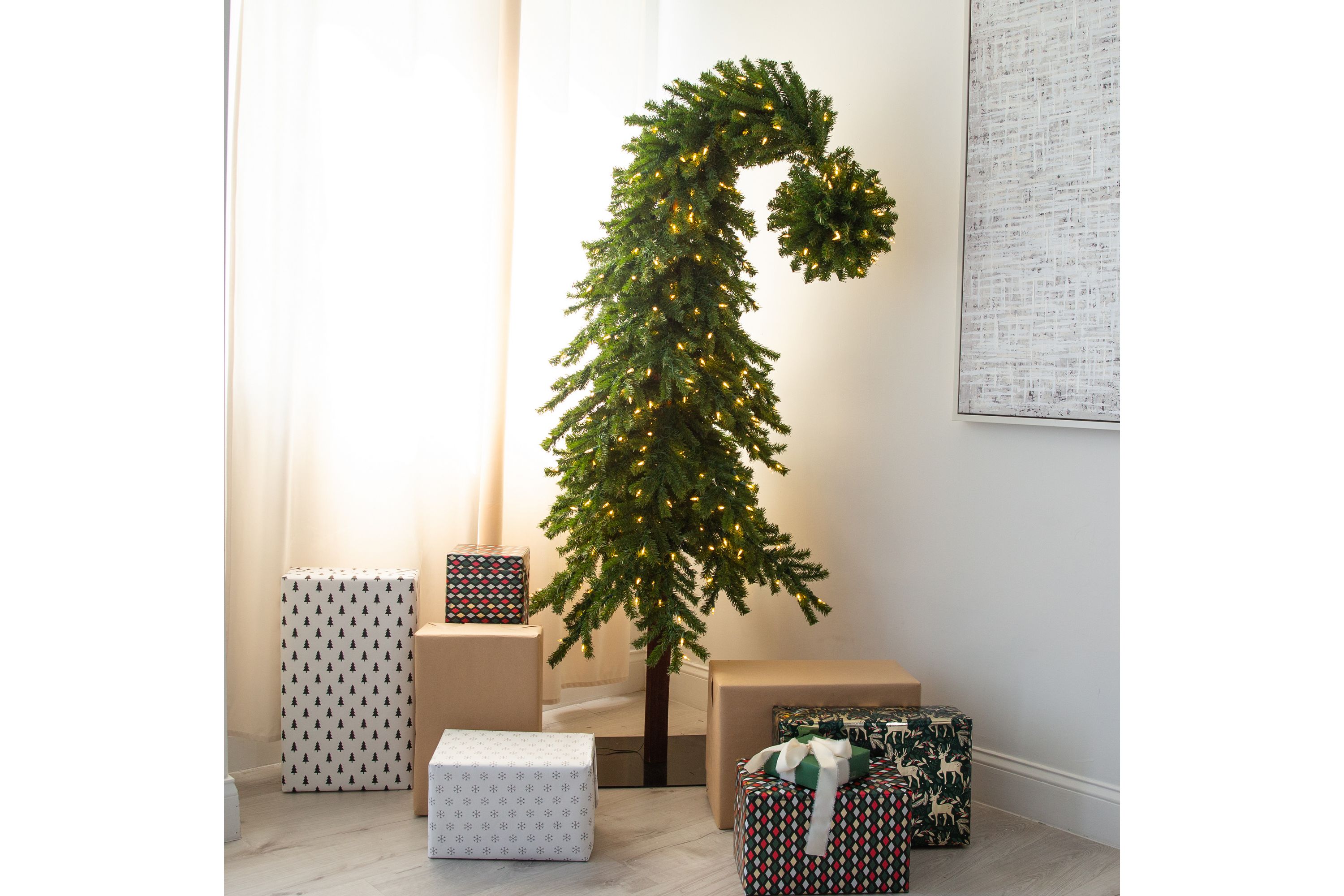 7ft. Holiday Green Santa’s Hat Christmas Tree with 500 LED Lights and 1275 Bendable Branches