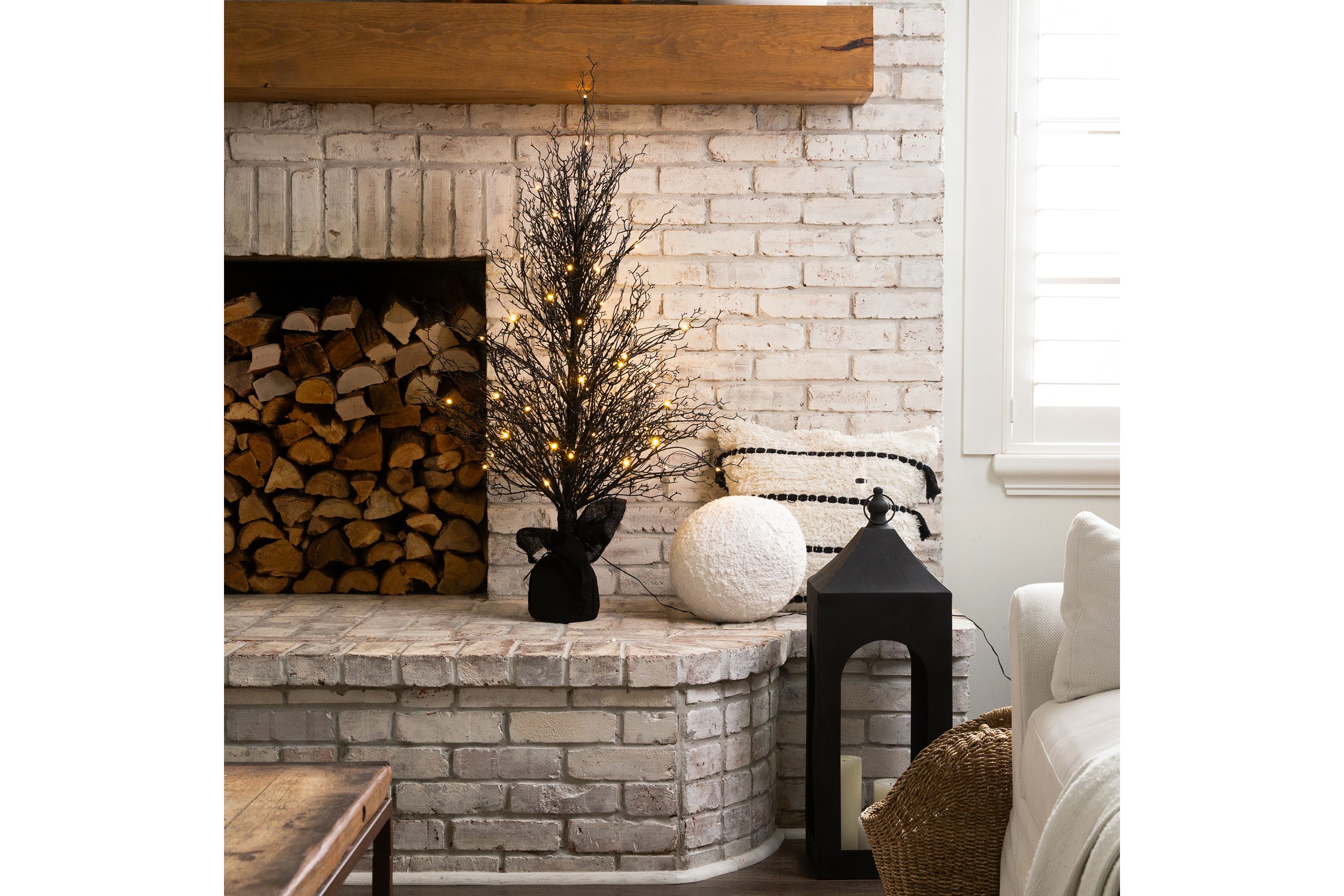 4ft. Pre-Lit Halloween Black Twig Artificial Fall Tree in Burlap Planter with 63 Warm White LED Lights