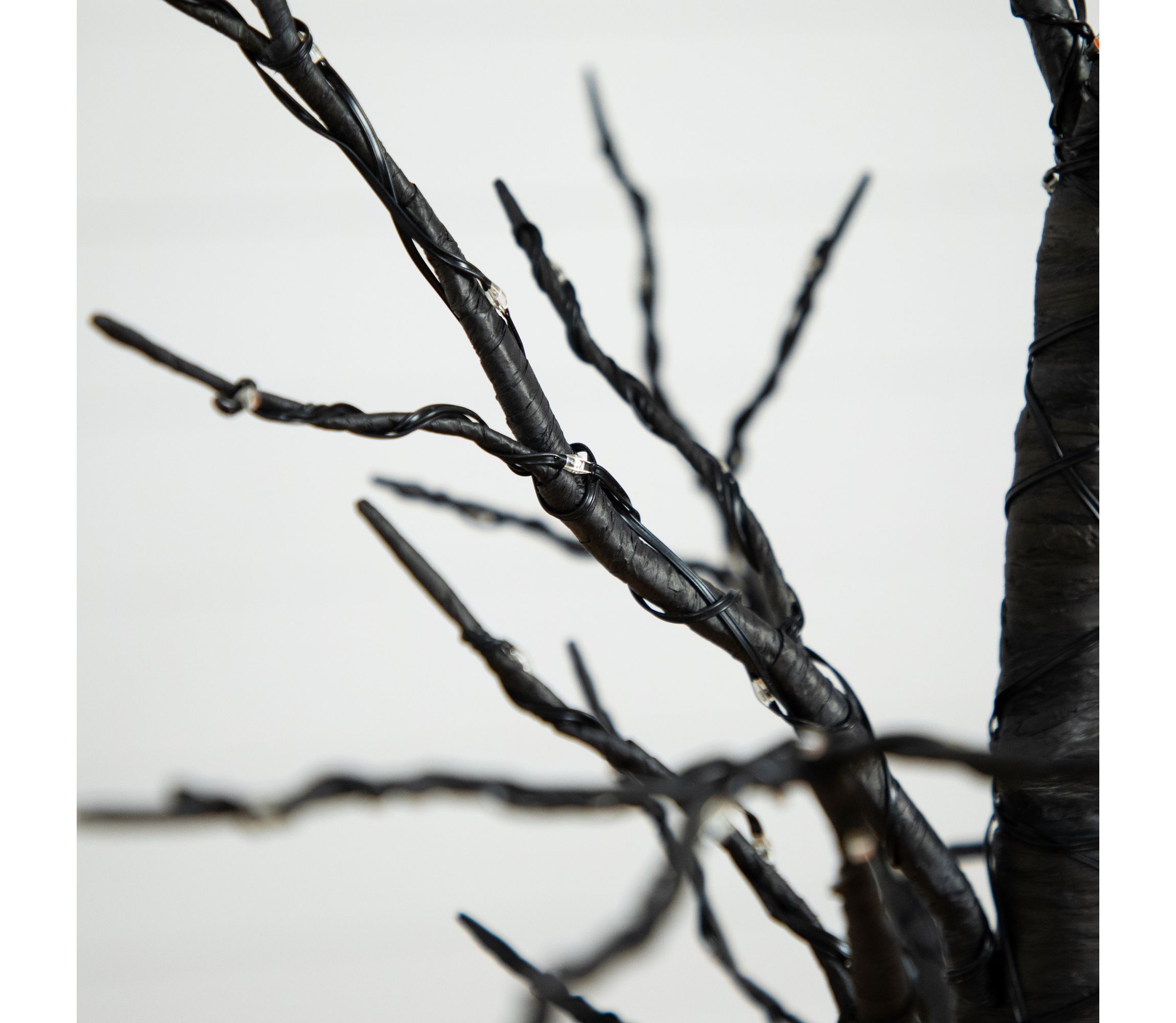 4ft. Pre-Lit Halloween Black Twig Artificial Fall Tree with 240 Orange and Purple LED Lights