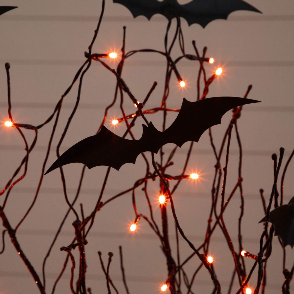 4-Foot Pre-Lit Artificial Halloween Black Twig Tree with Bats and 50 Orange LED Lights