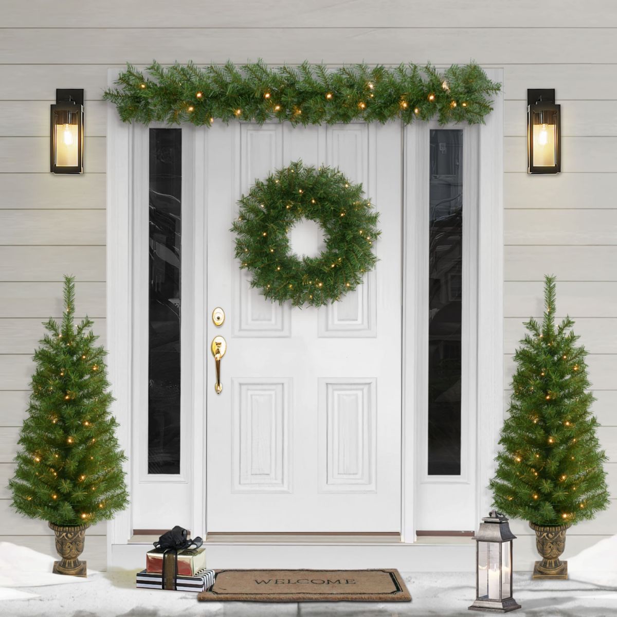 Puleo International 4-Piece Pre-Lit Artificial Christmas Décor Set Featuring 2 Trees, 1 Wreath, and 1 Garland