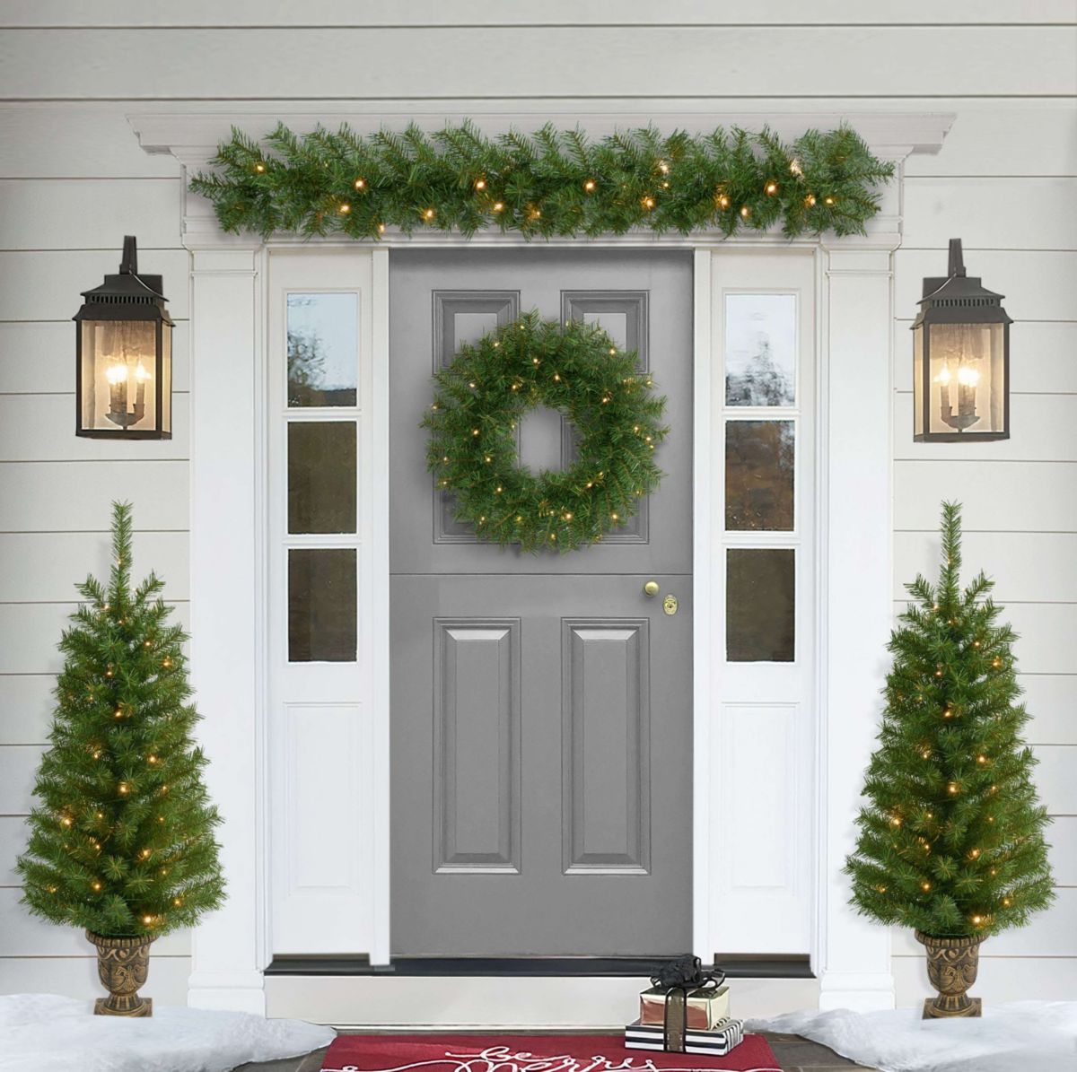 Puleo International 4-Piece Pre-Lit Artificial Christmas Décor Set Featuring 2 Trees, 1 Wreath, and 1 Garland