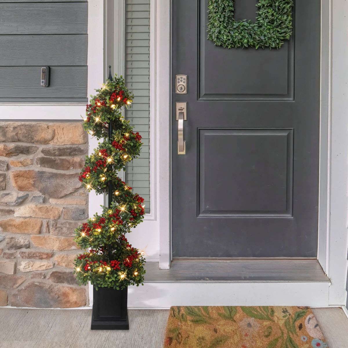 Puleo International 4 Pre-Lit Artificial Potted Swirl Tree Adorned with Red Berries