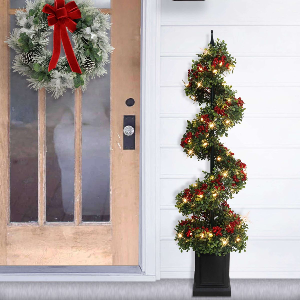 Puleo International 4 Pre-Lit Artificial Potted Swirl Tree Adorned with Red Berries