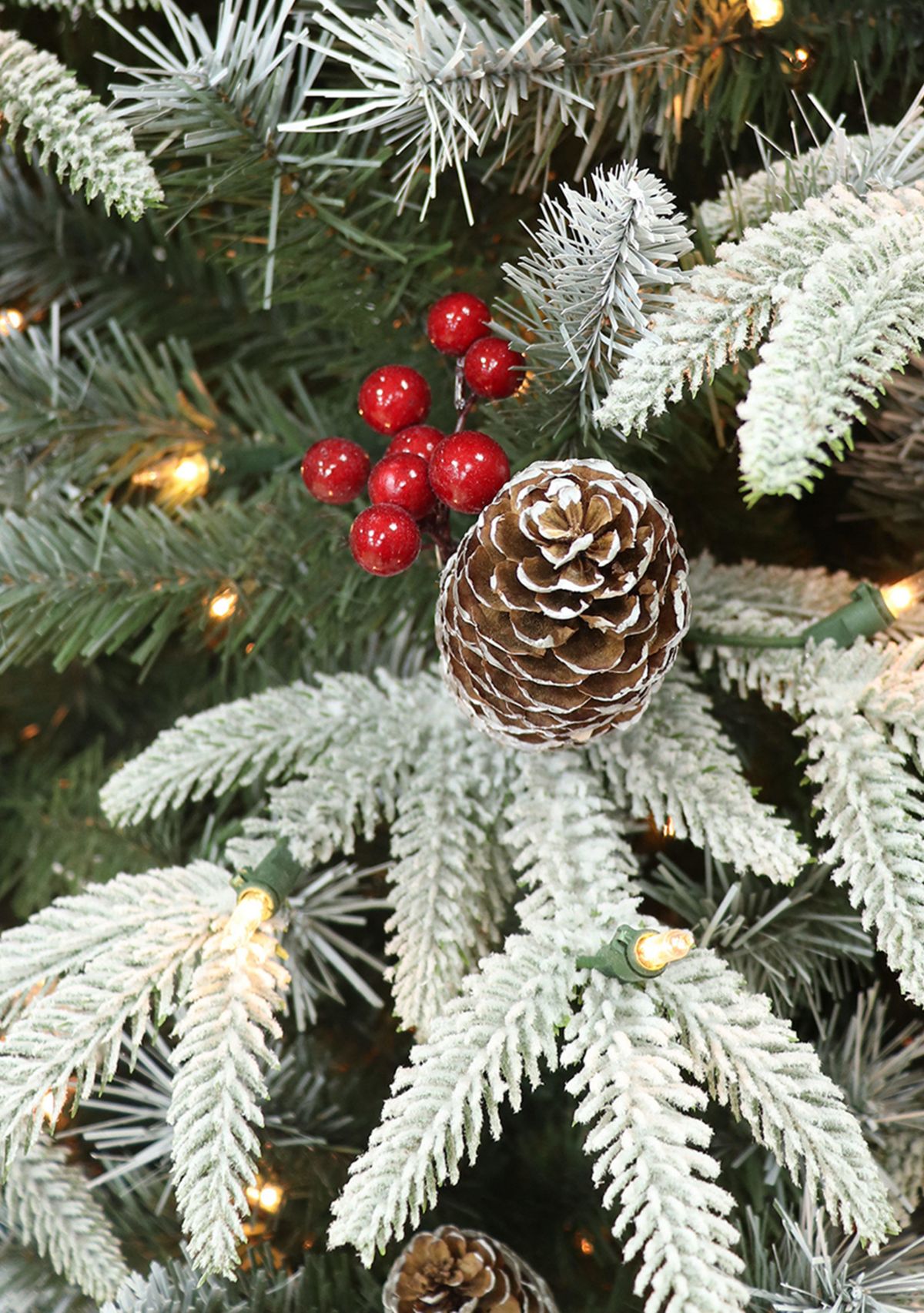 4.5 ft Pre-lit Potted Flocked Halifax Fir Artificial Christmas Tree with 70 UL Clear Lights Pinecones & Red Berries Green