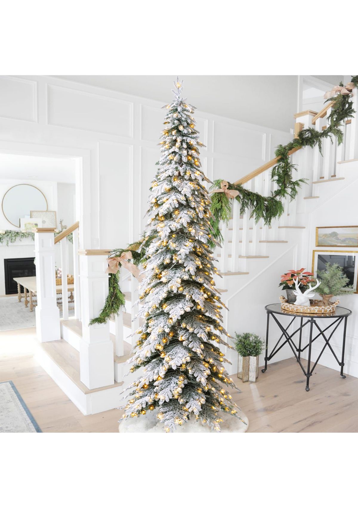 11-foot Pre-Lit Flocked Pencil Spruce Artificial Christmas Tree with 700 Warm White Lights
