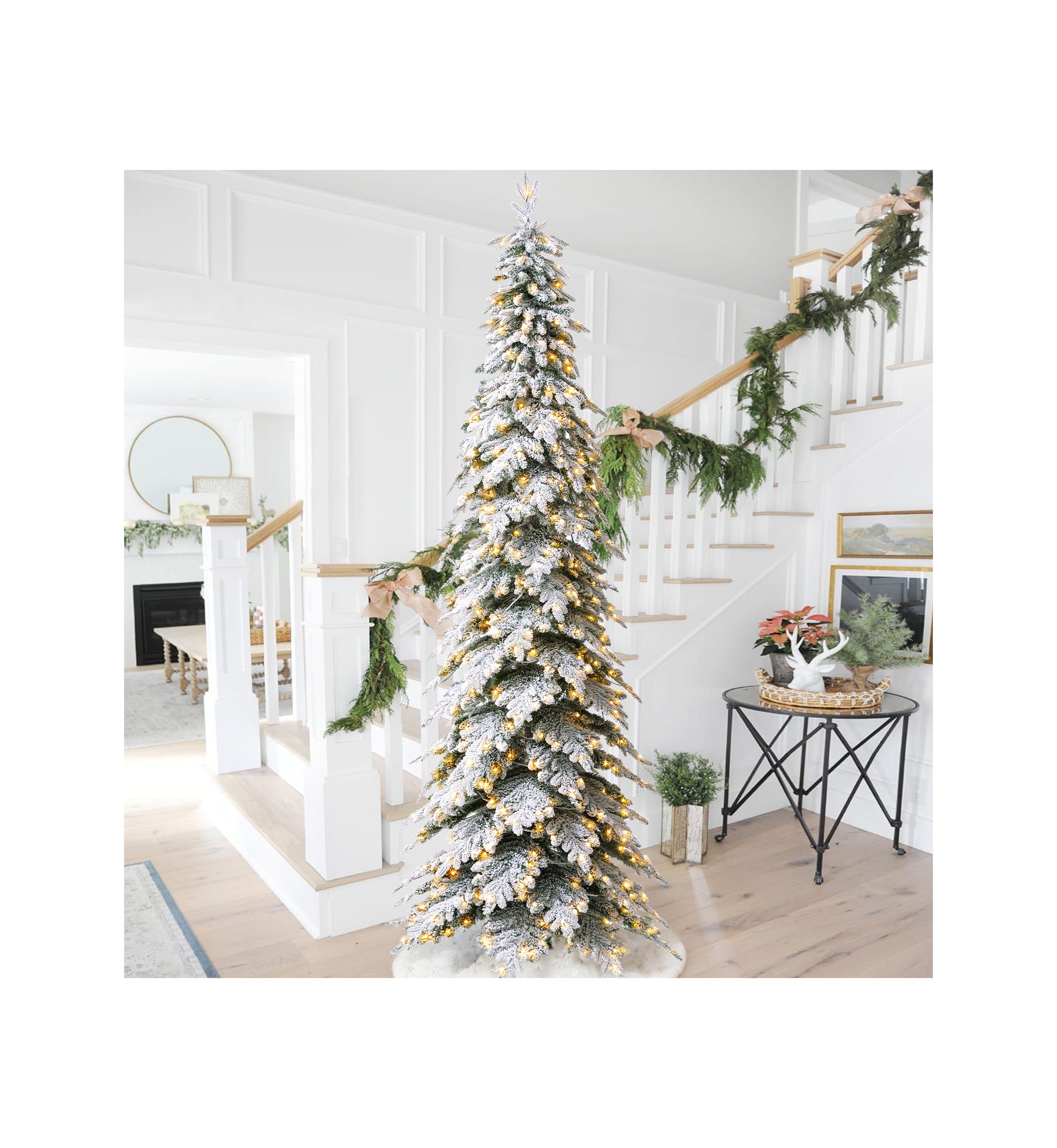 11-foot Pre-Lit Flocked Pencil Spruce Artificial Christmas Tree with 700 Warm White Lights