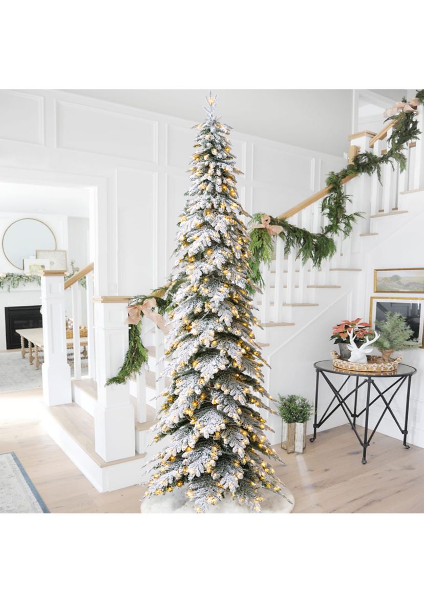 11-foot Pre-Lit Flocked Pencil Spruce Artificial Christmas Tree with 700 Warm White Lights
