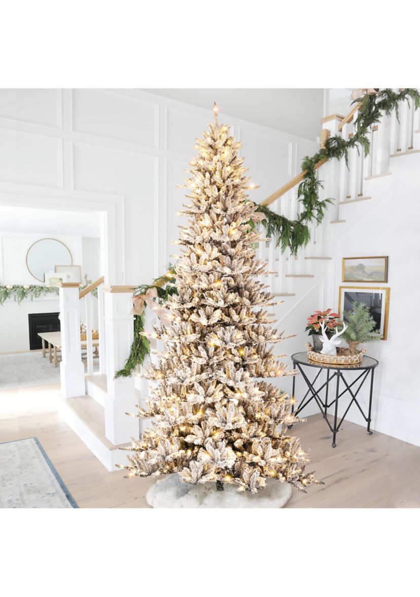 11-foot Pre-Lit Flocked Slim Fir Artificial Christmas Tree with 950 Warm White Lights