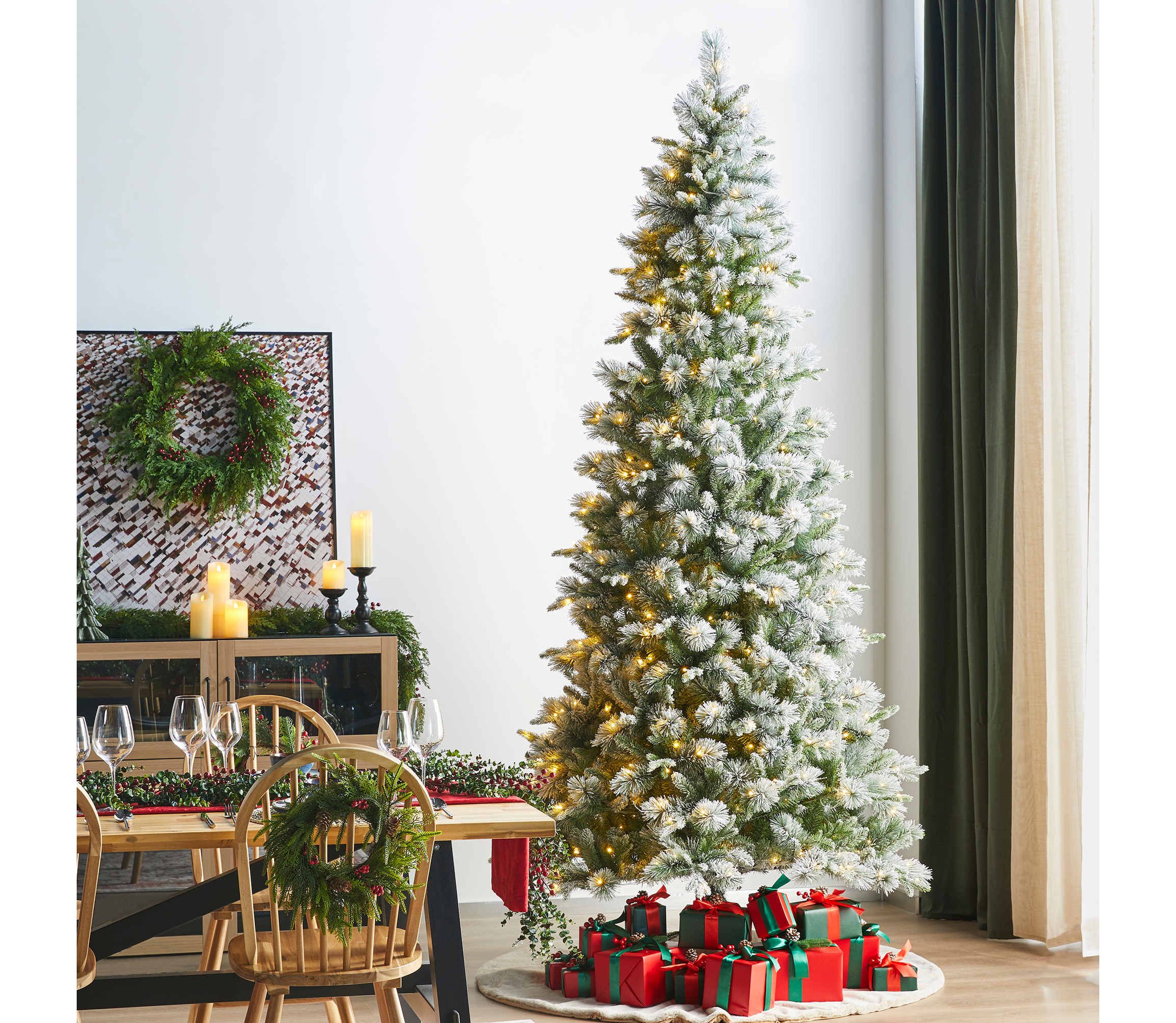 9ft Pre-Lit Flocked Slim Pine Artificial Christmas Tree with 600 Warm White LED lights, 3 function w/ Foot Pedal and Remote Control, Simple Setup