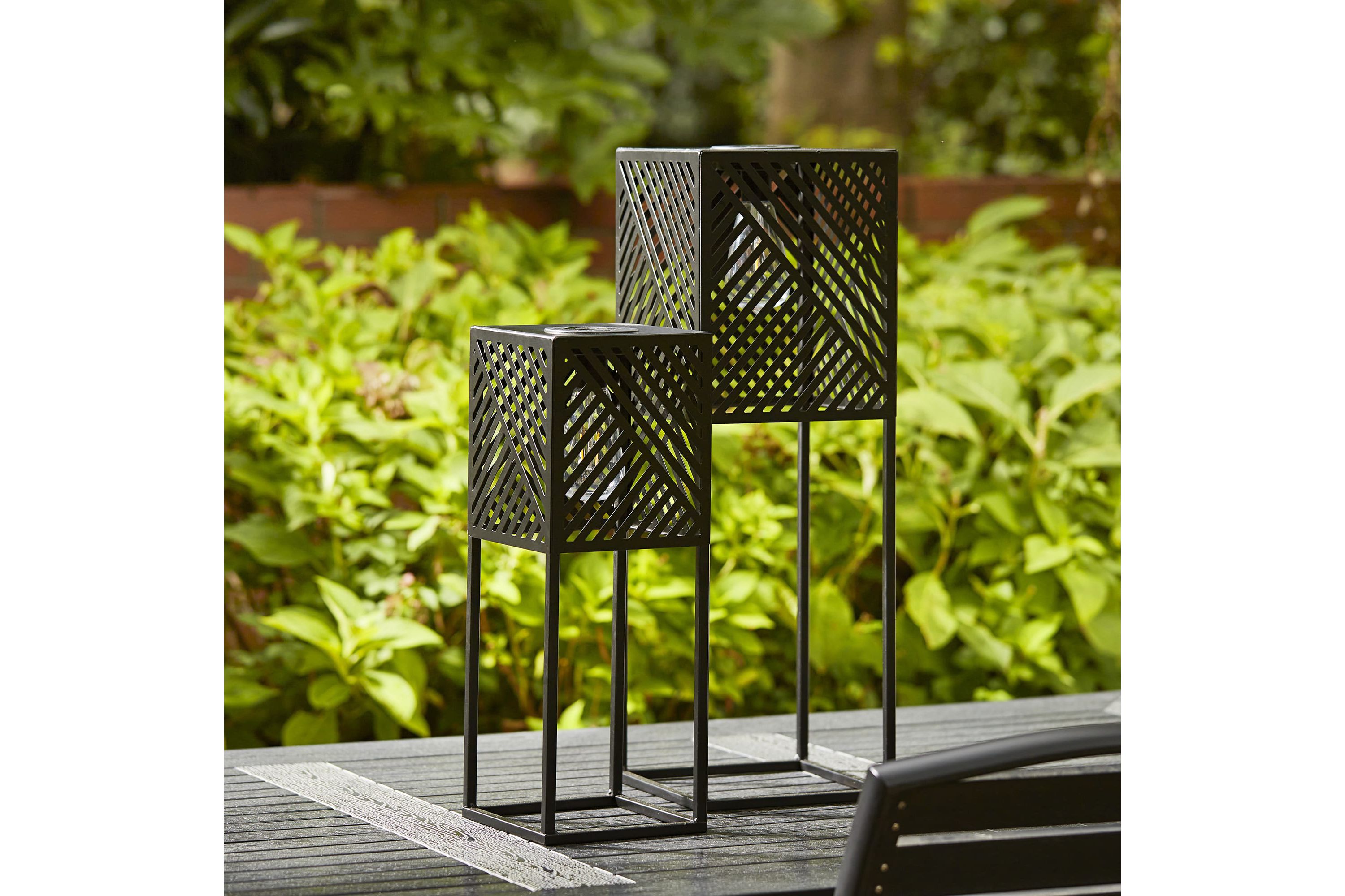 23.75"H / 17.75"H Set of 2 Black Metal Stripes Geometric Solar Powered Edison Bulb Outdoor Floor Lantern or planter standsL: 8"L X 8"W X 23.75"HS: 6.5"L X 6.5"W X 17.75"H