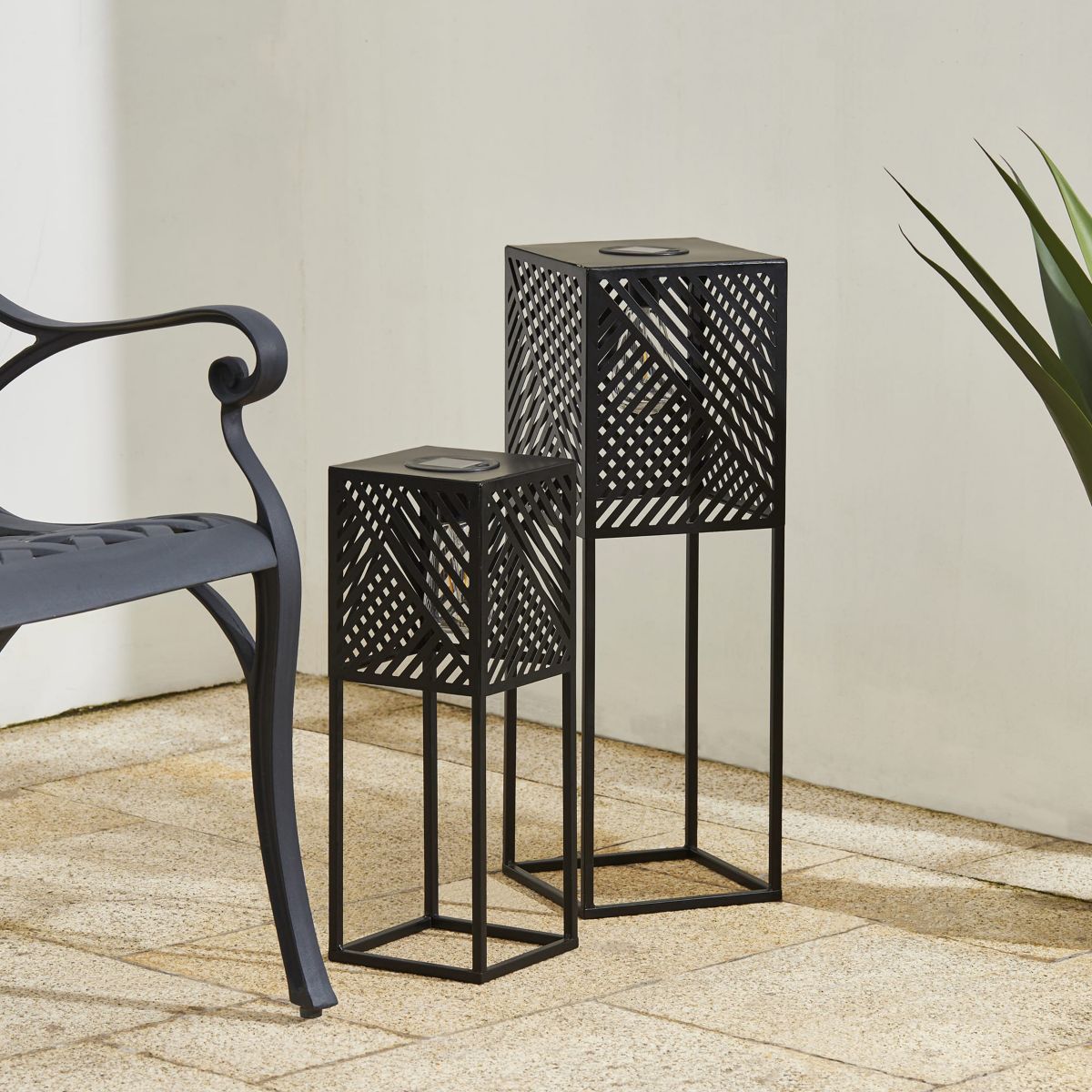 23.75"H / 17.75"H Set of 2 Black Metal Stripes Geometric Solar Powered Edison Bulb Outdoor Floor Lantern or planter standsL: 8"L X 8"W X 23.75"HS: 6.5"L X 6.5"W X 17.75"H