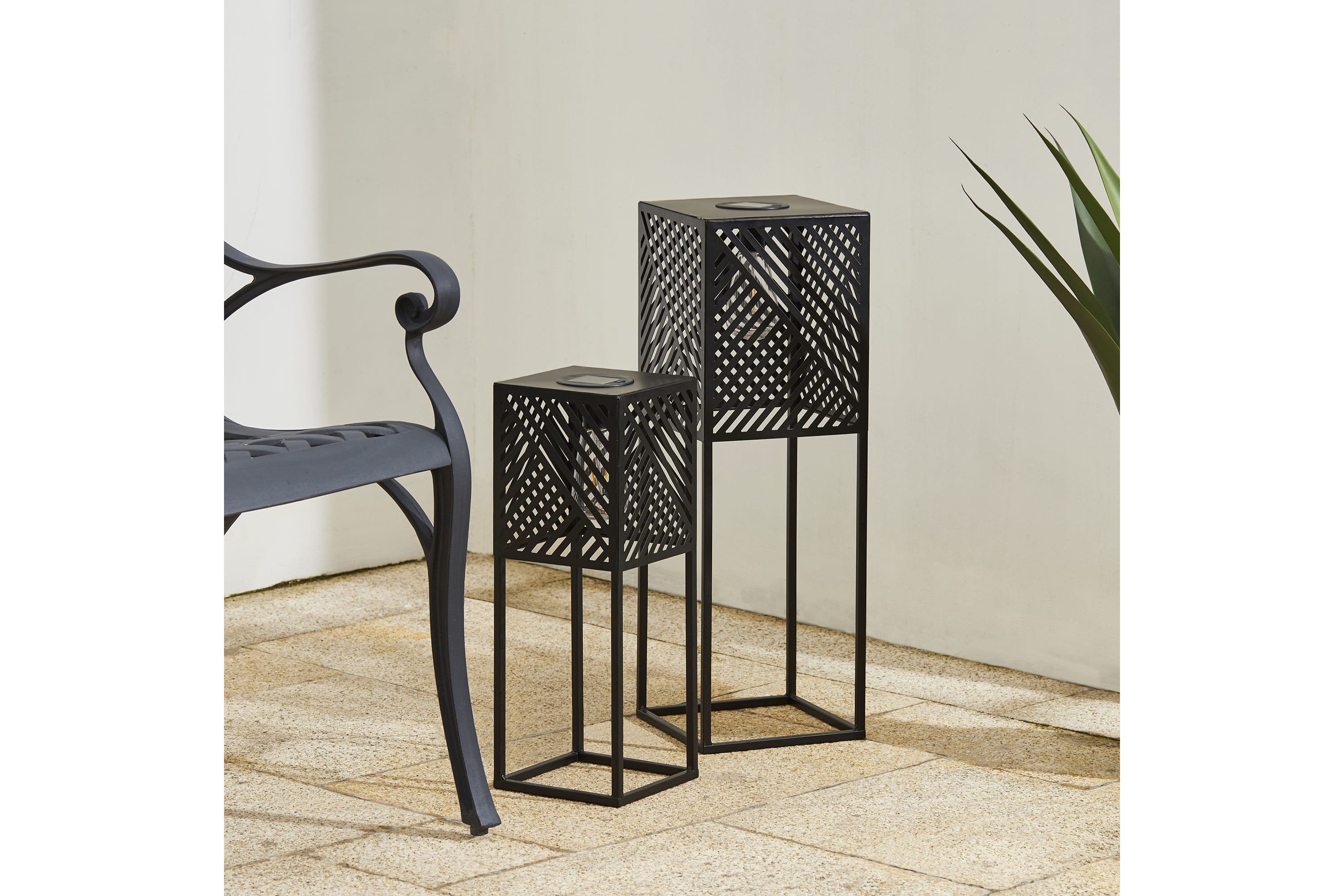23.75"H / 17.75"H Set of 2 Black Metal Stripes Geometric Solar Powered Edison Bulb Outdoor Floor Lantern or planter standsL: 8"L X 8"W X 23.75"HS: 6.5"L X 6.5"W X 17.75"H