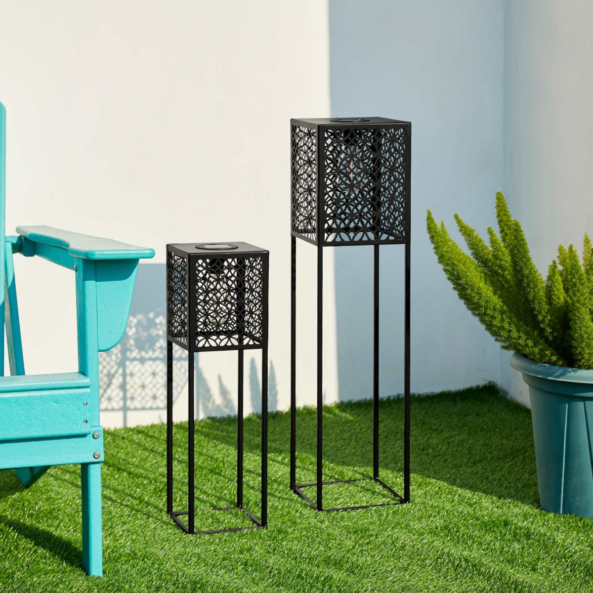 32"H / 22.25"H Oversized Set of 2 Black Metal Cutout Pattern Solar Powered Edison Bulb Outdoor Floor Lantern or planter standsL: 8"L X 8"W X 32"HS: 6.5"L X 6.5"W X 22.25"H