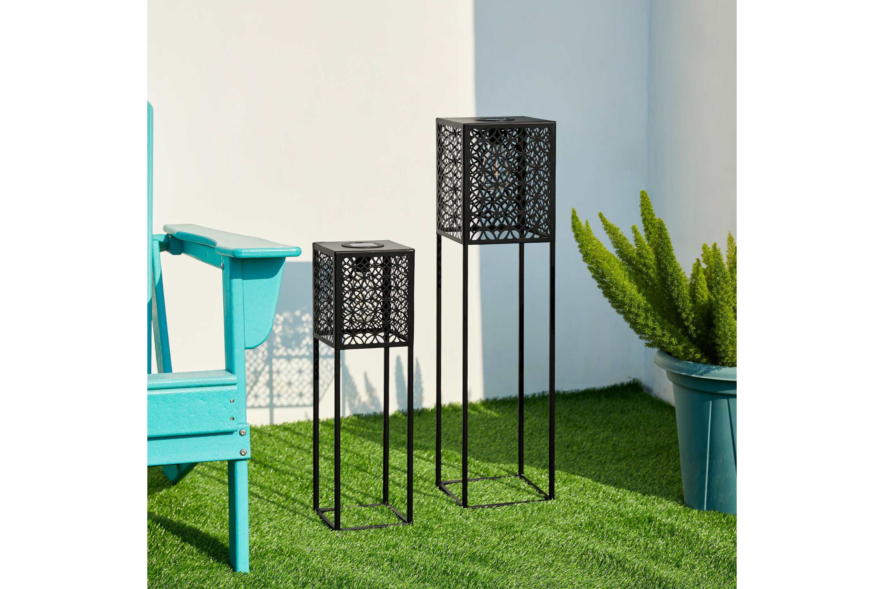 32"H / 22.25"H Oversized Set of 2 Black Metal Cutout Pattern Solar Powered Edison Bulb Outdoor Floor Lantern or planter standsL: 8"L X 8"W X 32"HS: 6.5"L X 6.5"W X 22.25"H