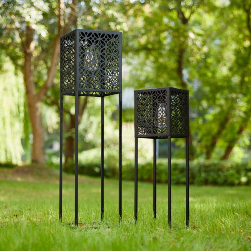 32"H / 22.25"H Oversized Set of 2 Black Metal Cutout Pattern Solar Powered Edison Bulb Outdoor Floor Lantern or planter standsL: 8"L X 8"W X 32"HS: 6.5"L X 6.5"W X 22.25"H