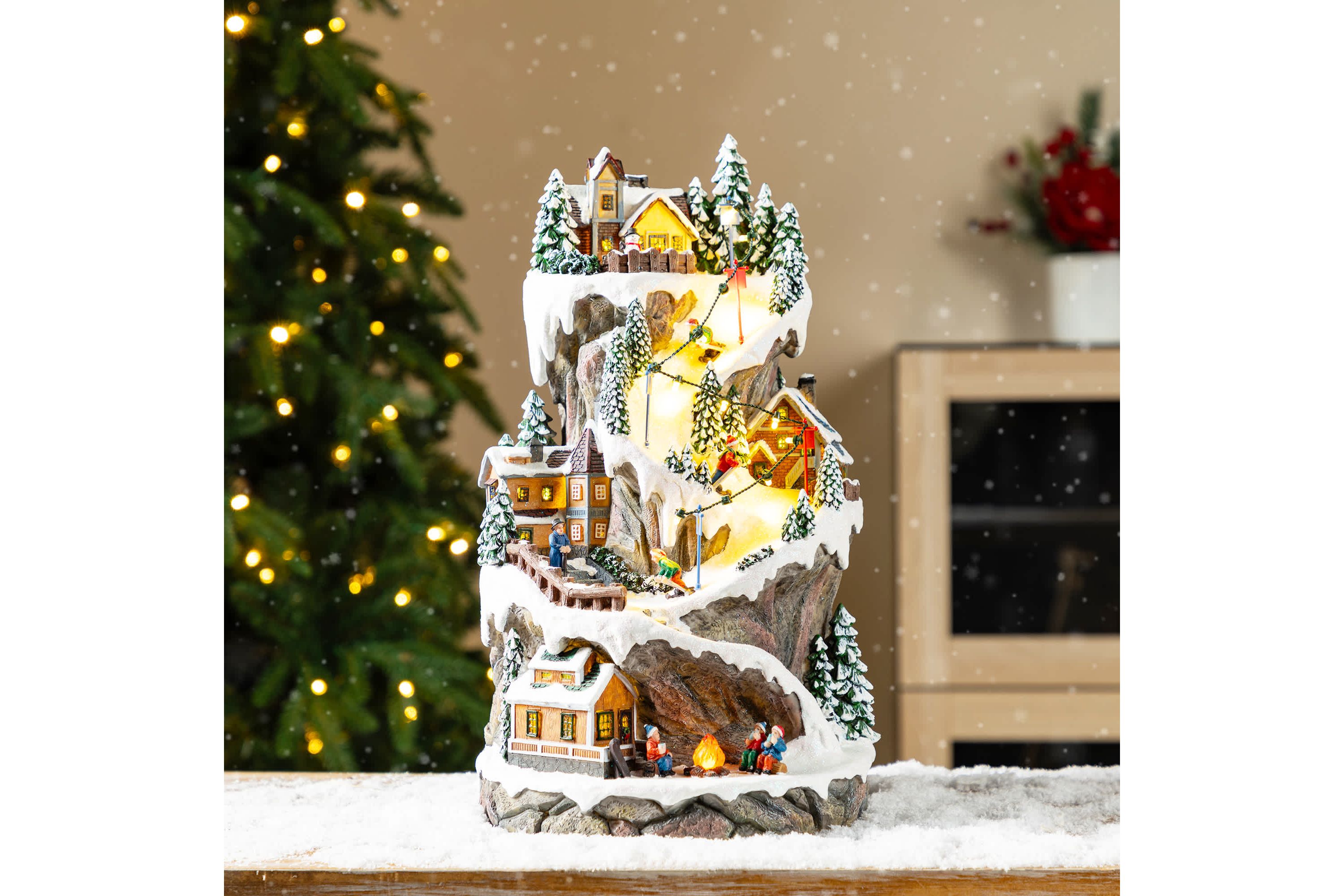 15.50"H Lighted Christmas Skiing Moutain Resin Village with Movement and Music