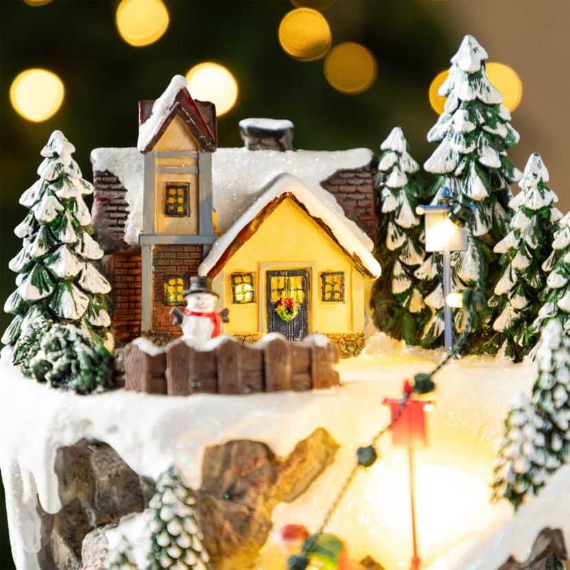 15.50"H Lighted Christmas Skiing Moutain Resin Village with Movement and Music