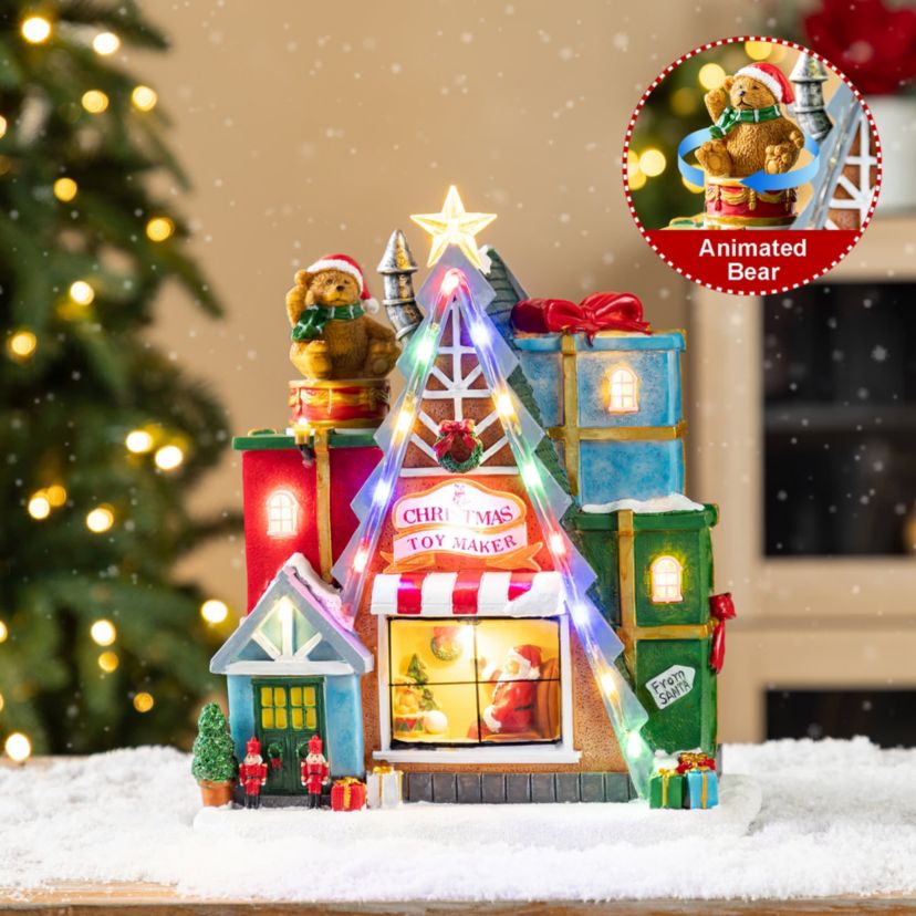 10.75"H Lighted CHRISTMAS TOY MARKET Resin Village with Movement and Music