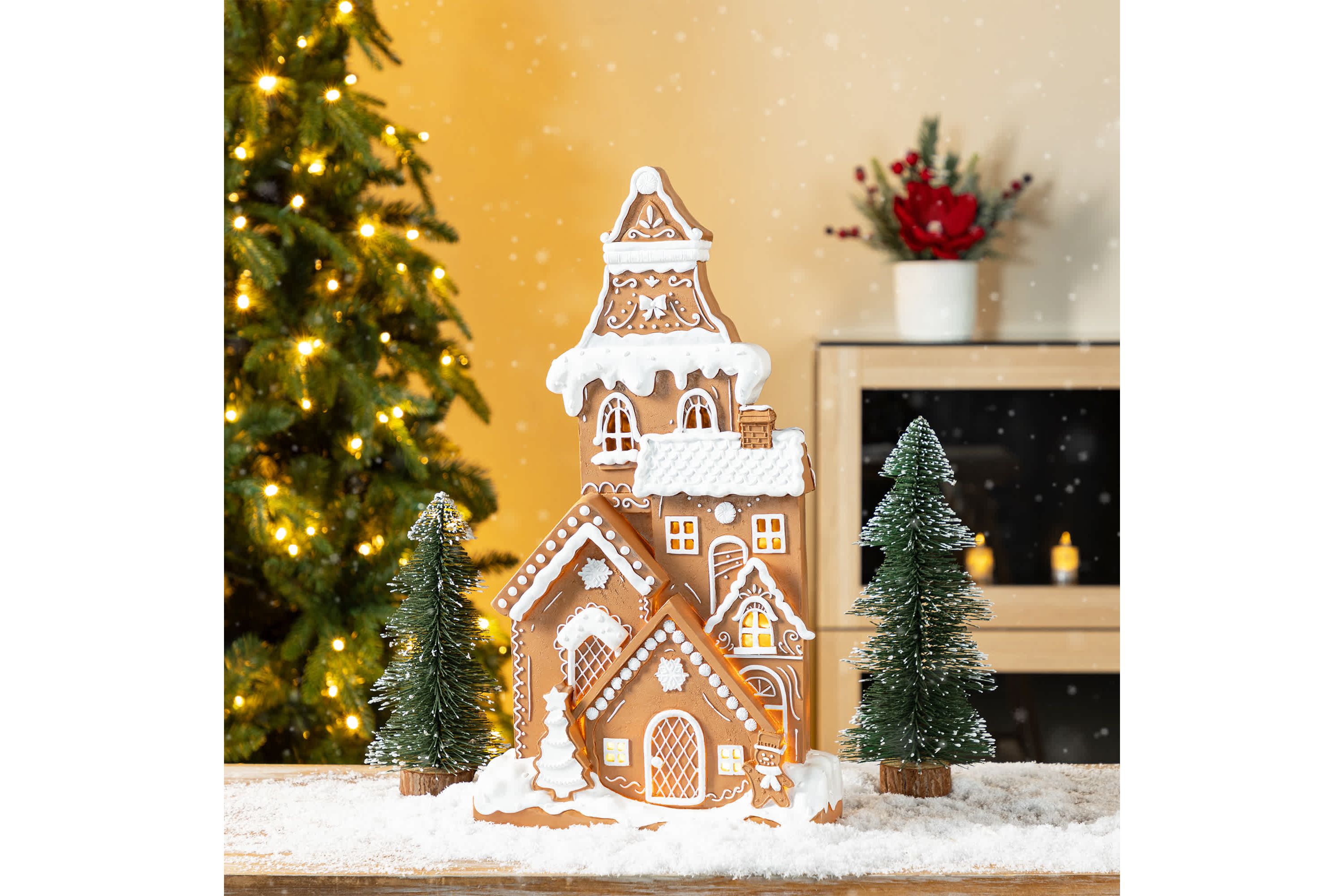 17.75"H Christmas Lighted Resin Gingerbread House Table Decor