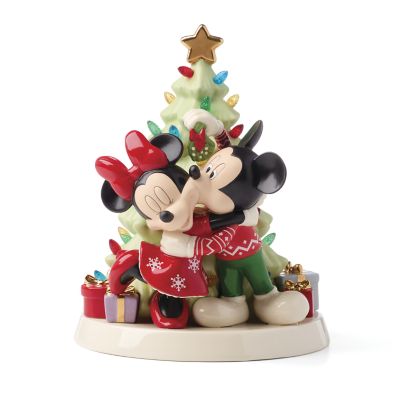 Lenox Bring extra happy to the holidays with this lit Christmas tree figurine] Features Mickey & Minnie Mouse happily embracing in a bright and