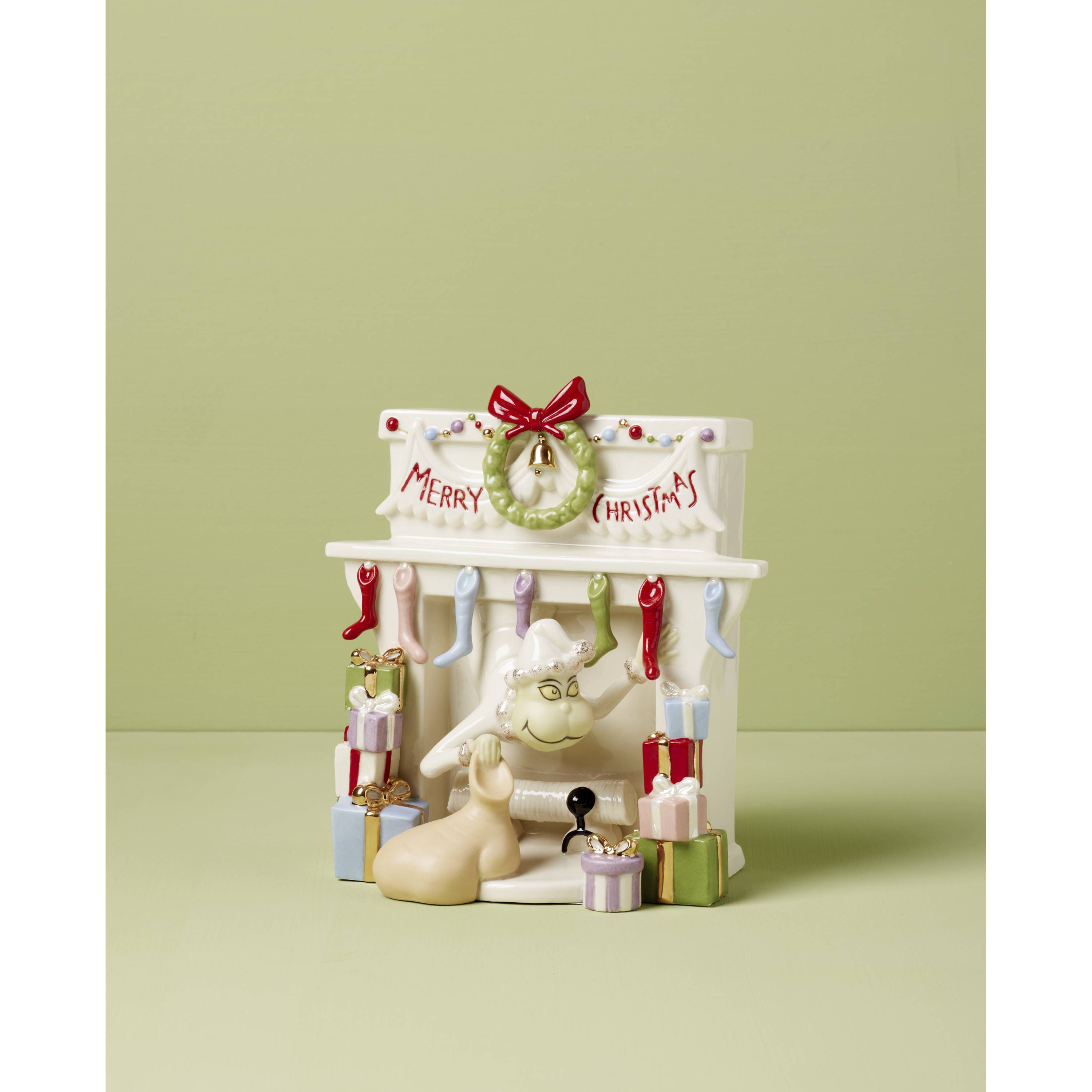 Grinch Stealing Stockings Figurine