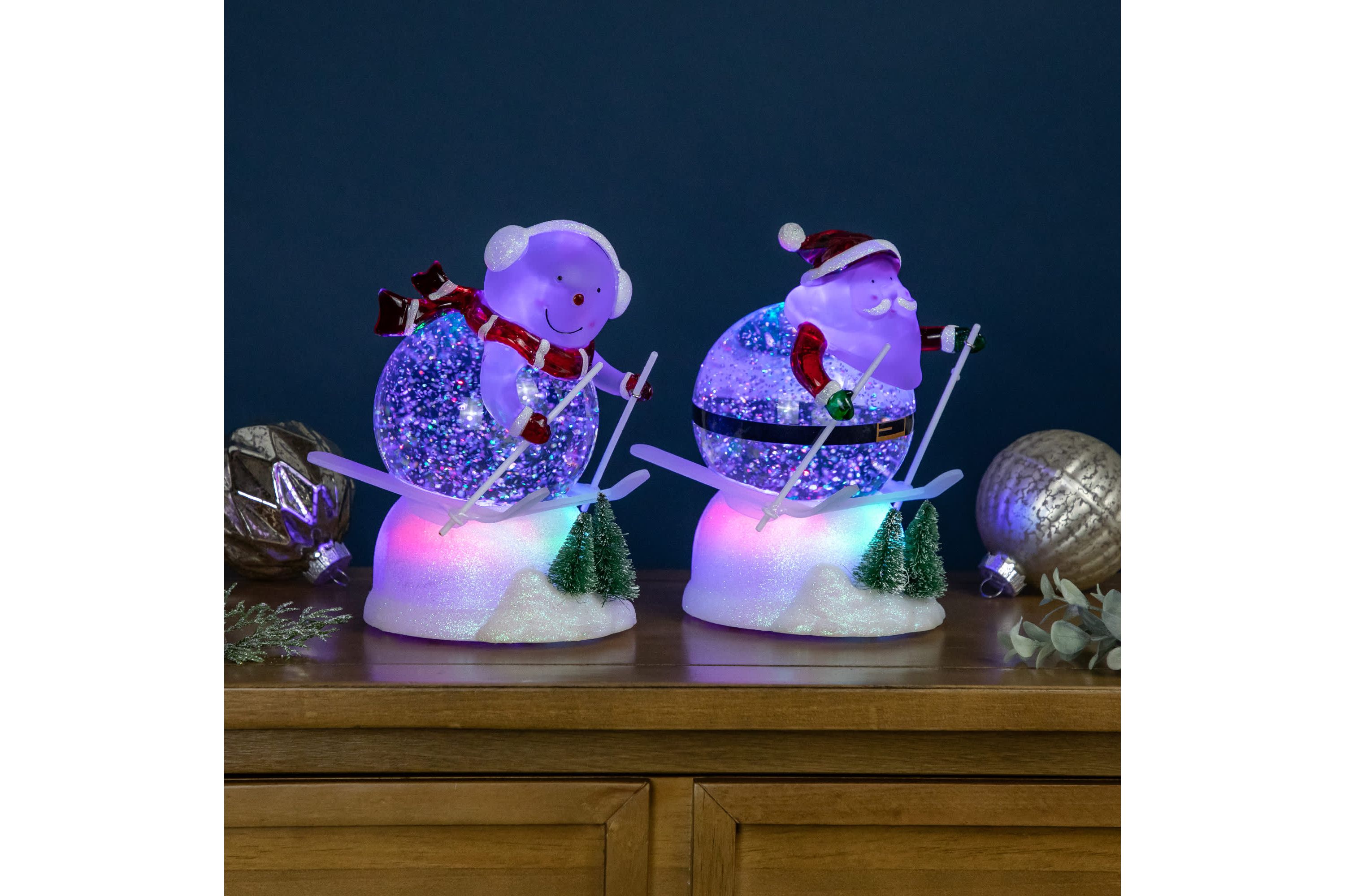 LED Lighted Color Changing Skiing Santa and Snowman Acrylic Christmas Snow Globes - 7.25" - Set of 2