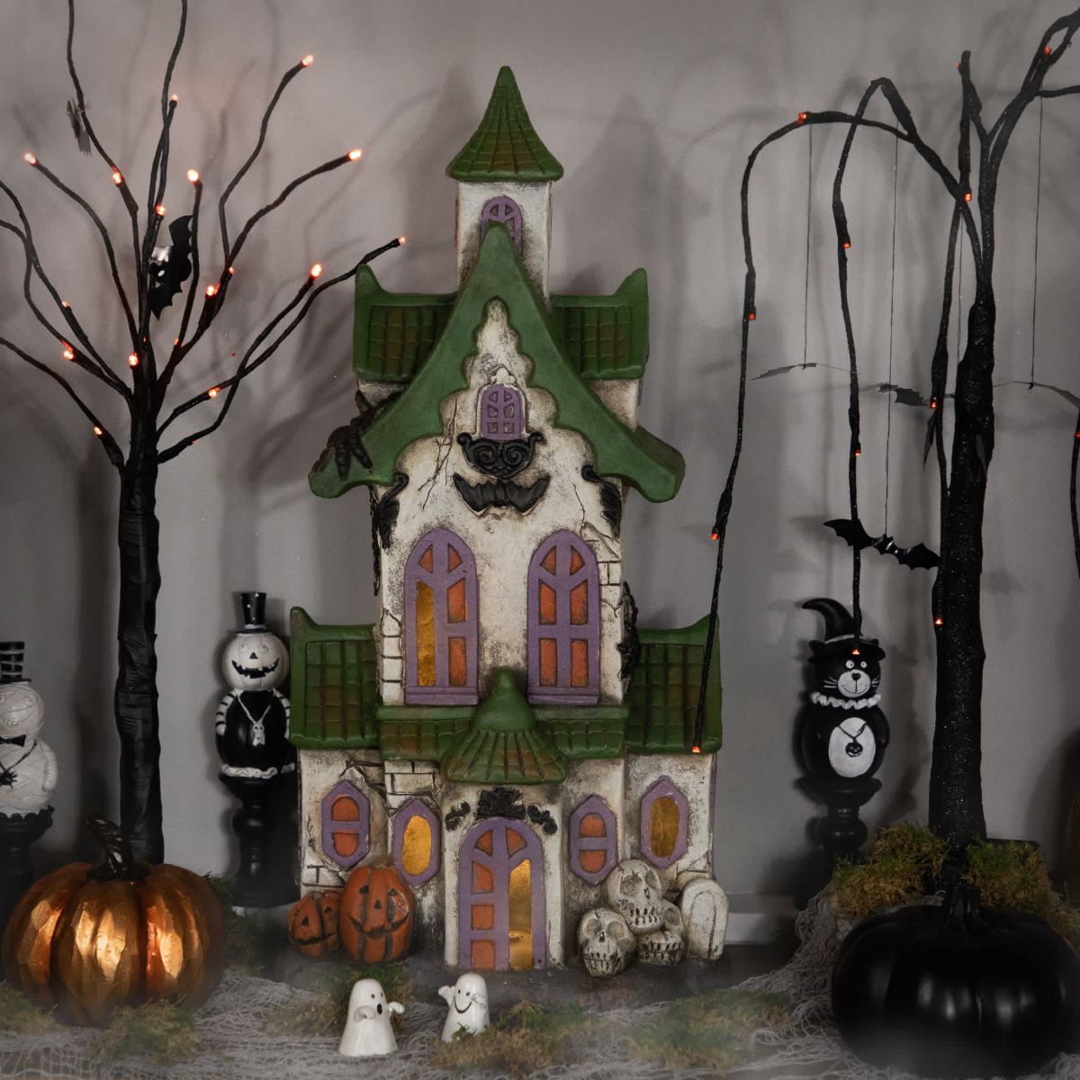 LED Lighted Haunted House with Skulls Halloween Decoration - 22.75"