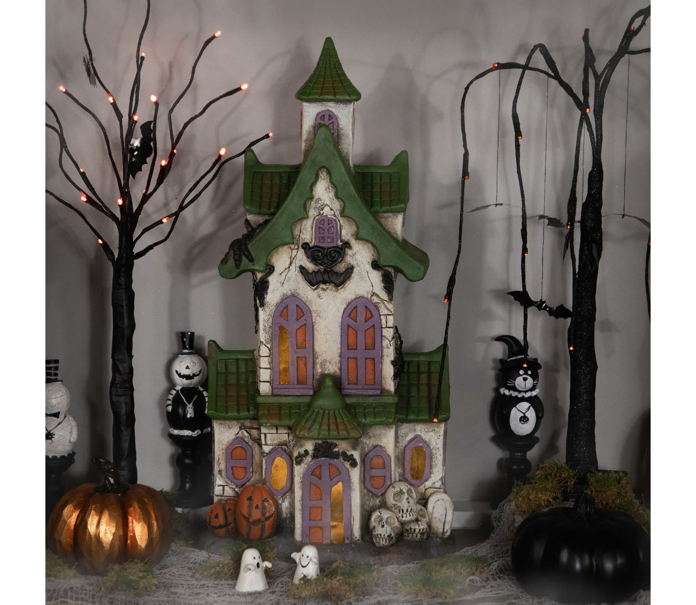 LED Lighted Haunted House with Skulls Halloween Decoration - 22.75"