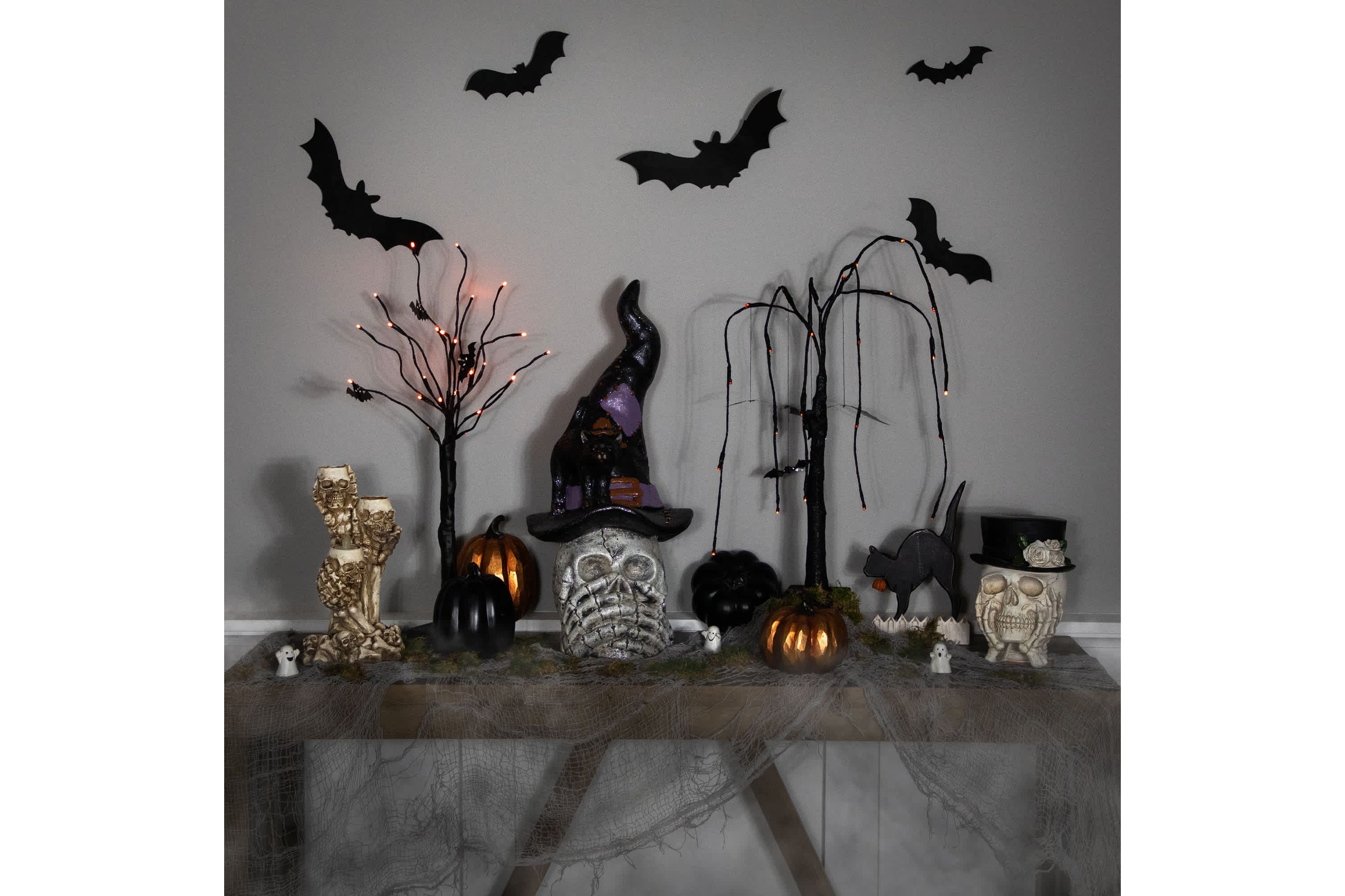 Skull and Skeleton Hands in Witch Hat with Black Cat Halloween Decoration - 22.75"