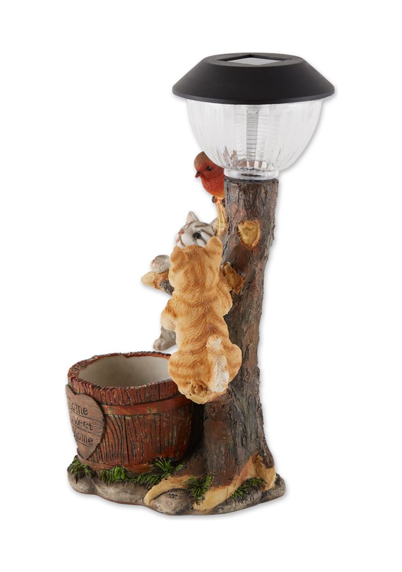 Dog and Fire Helmet Solar Statue 6x7.25x8.75"