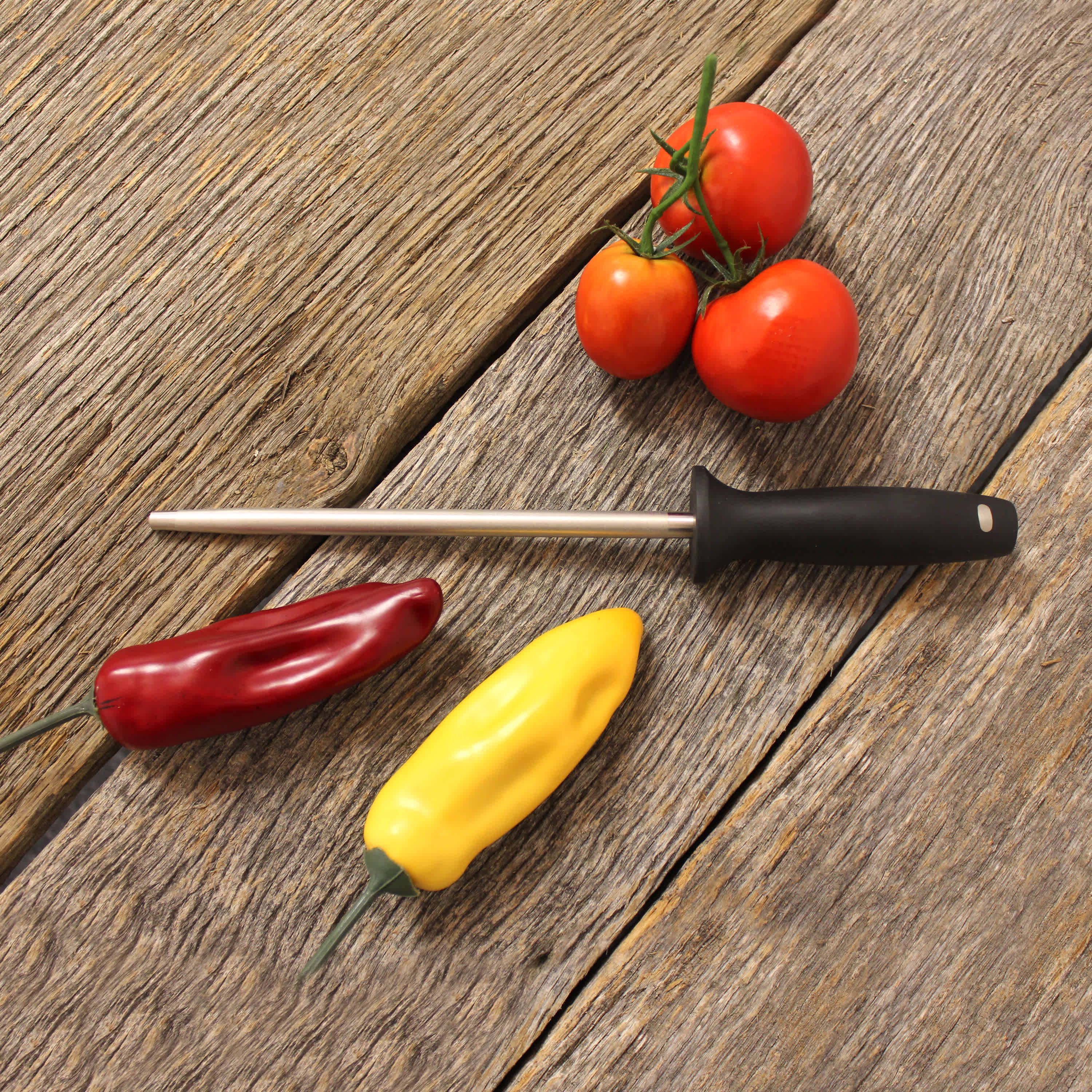 BergHOFF Essentials Stainless Steel Hand-sharpened Blade Sharpener 10" Gourmet Ergonomically Designed POM Contoured Handle Seamless Construction Forged Blade Well Balance