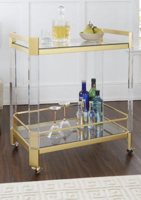 gold and lucite bar cart